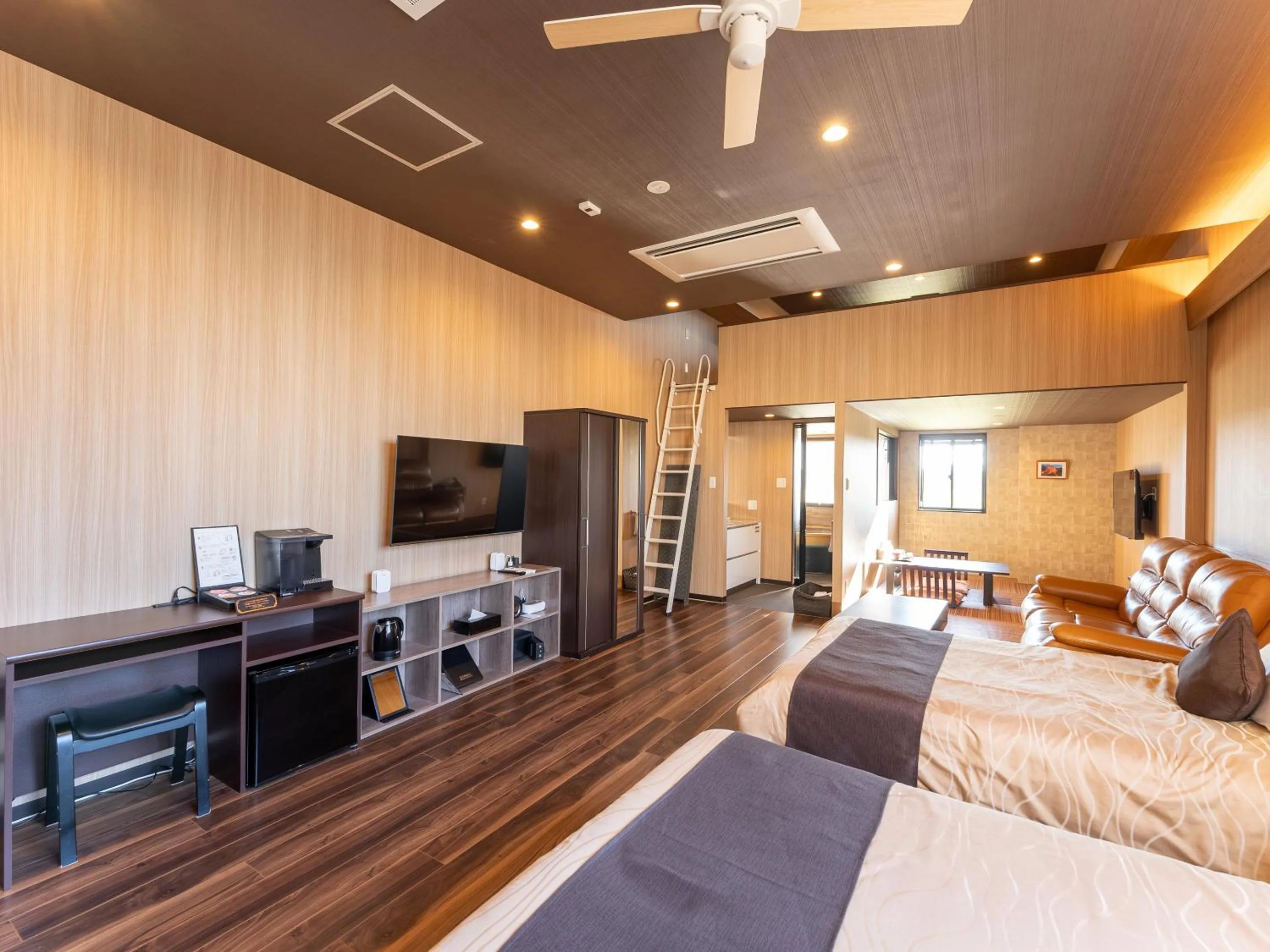 Bed in LiVEMAX RESORT Sakurajima Sea Front