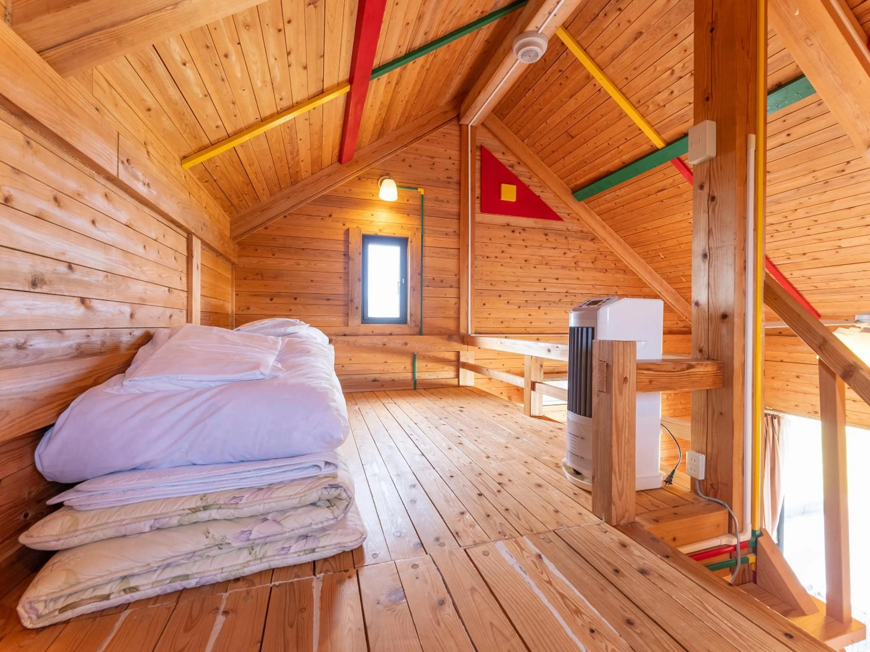 Bed in LiVEMAX RESORT Sakurajima Sea Front