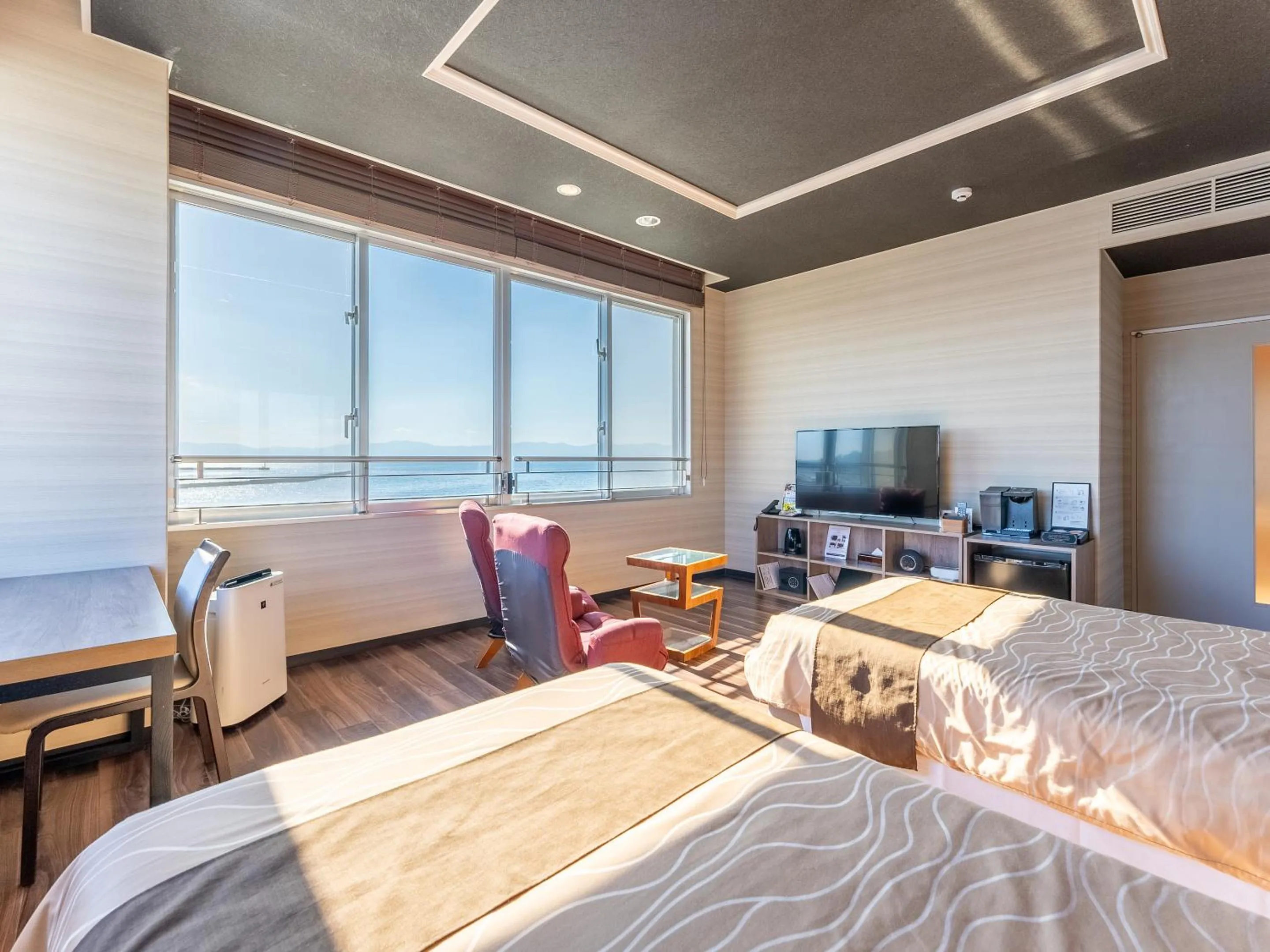 Bed in LiVEMAX RESORT Sakurajima Sea Front