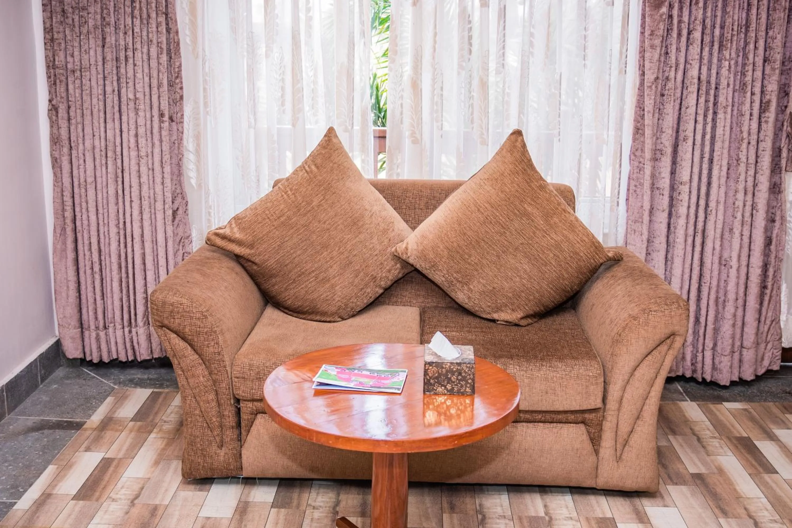 Seating area in Hotel Earth Light Sauraha