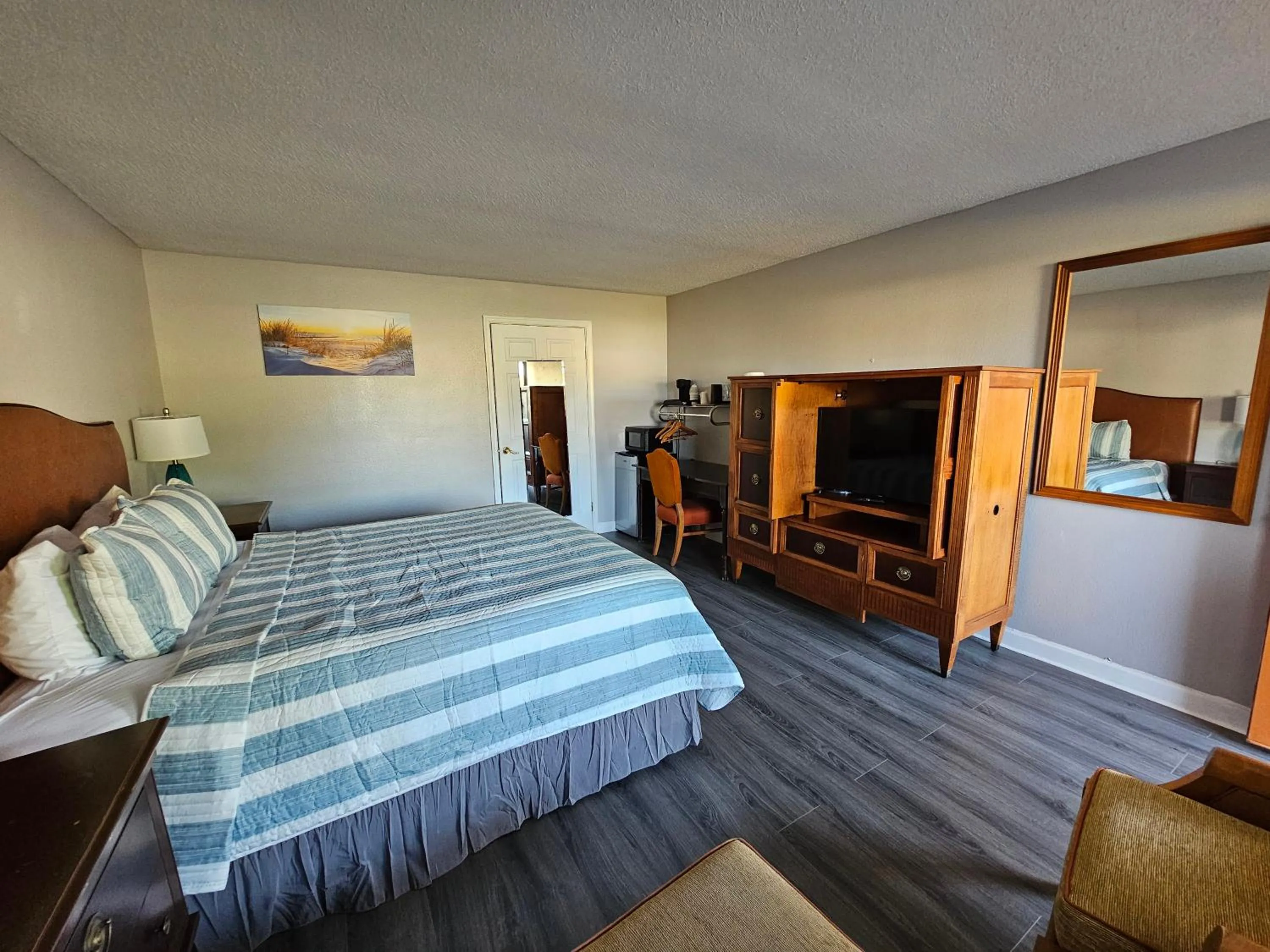 Bed in Atlantic Shores Inn and Suites