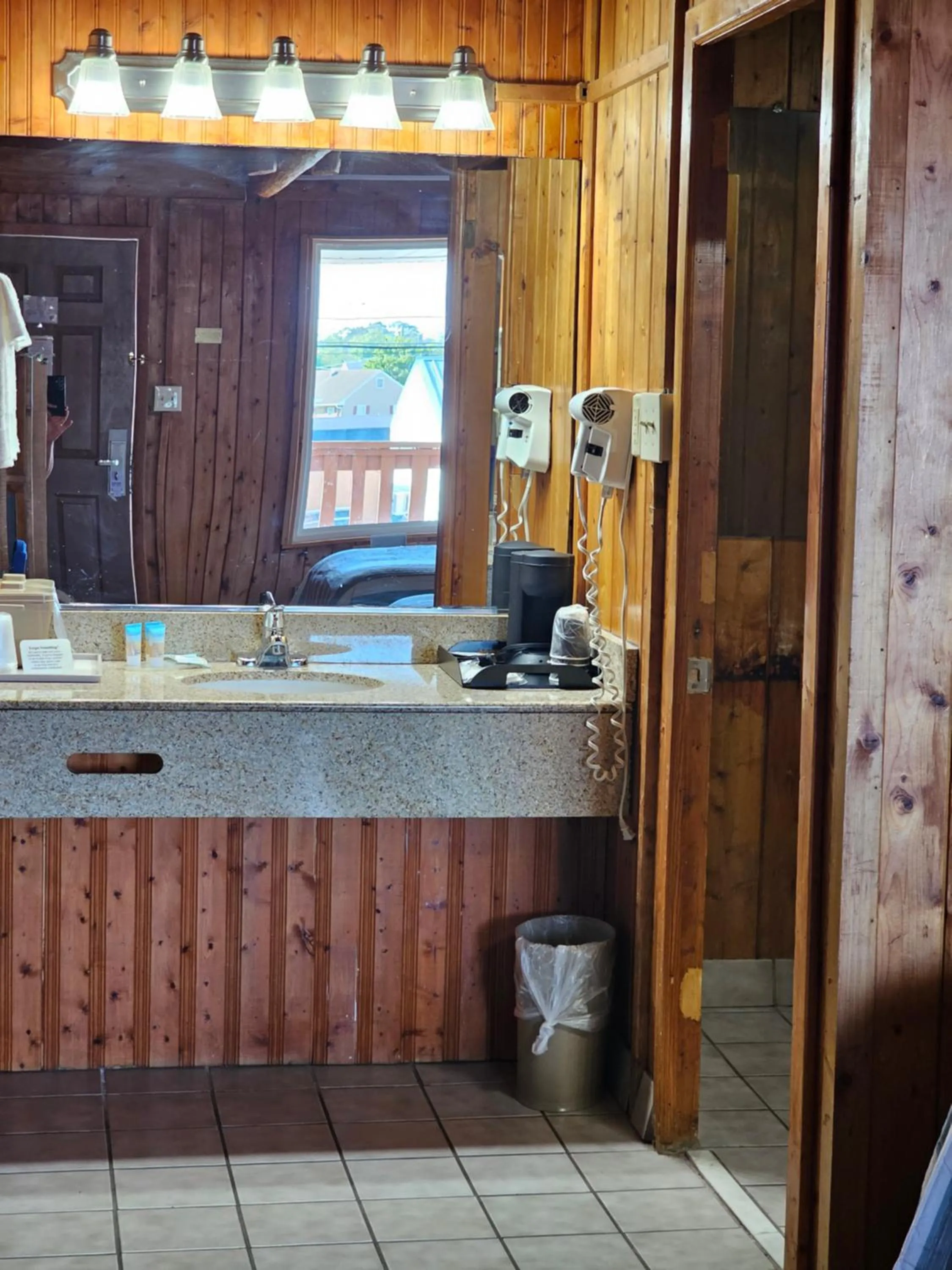Bedroom in Atlantic Shores Inn and Suites