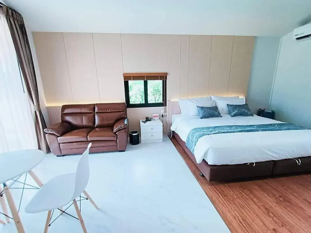 Seating area, Bed in Southern Airport Hotel Hatyai Seating area, Bed in Southern Airport Hotel Hatyai