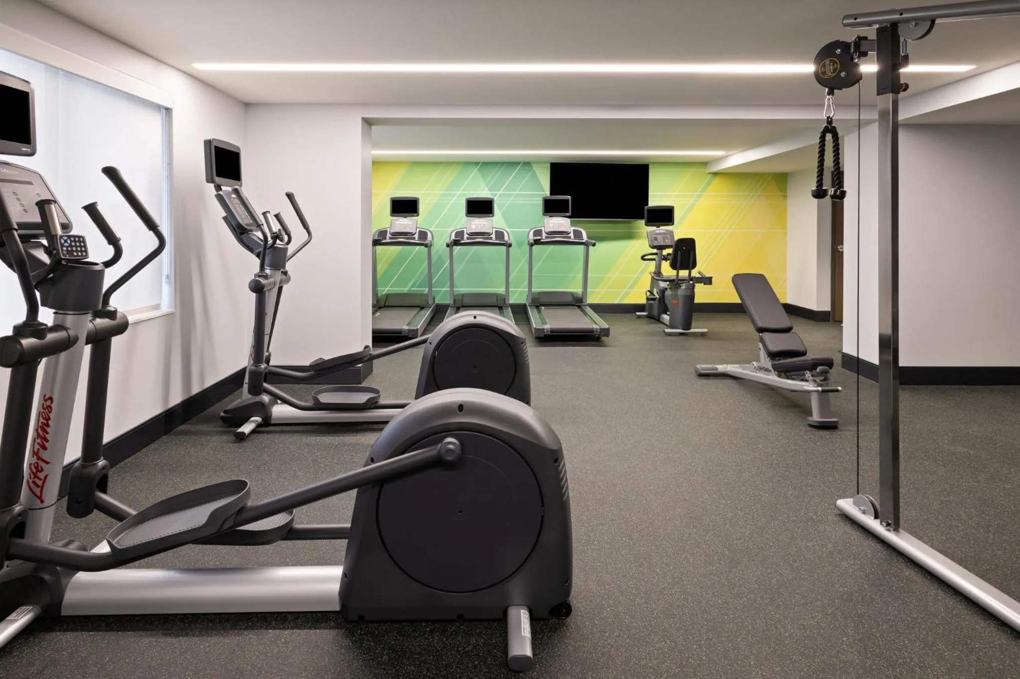 Fitness centre/facilities in Holiday Inn & Suites Richmond West End by IHG