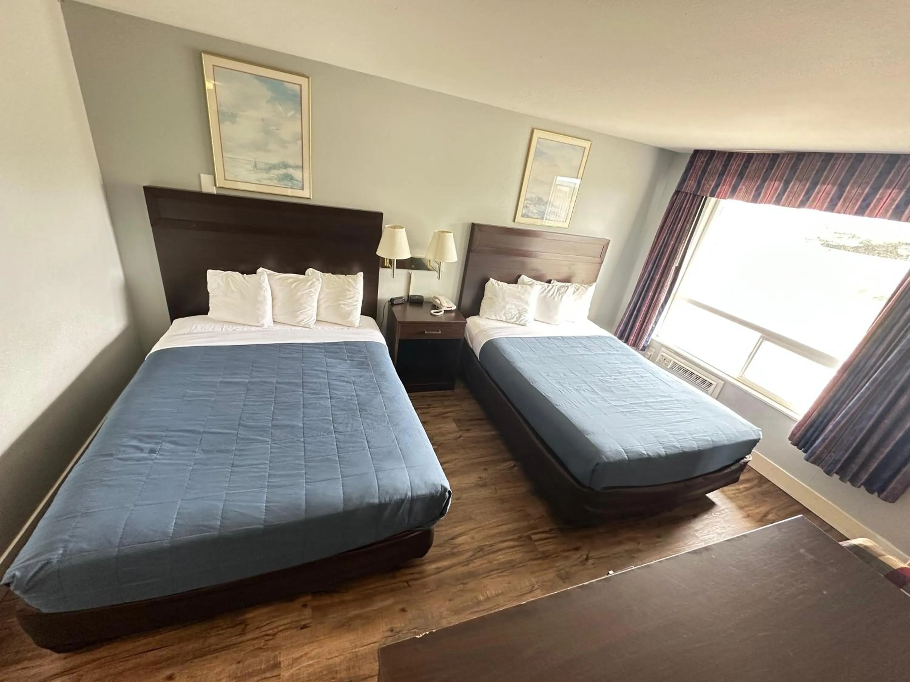 Bed in Coratel Inn and Suites By Jasper Ocean Shores