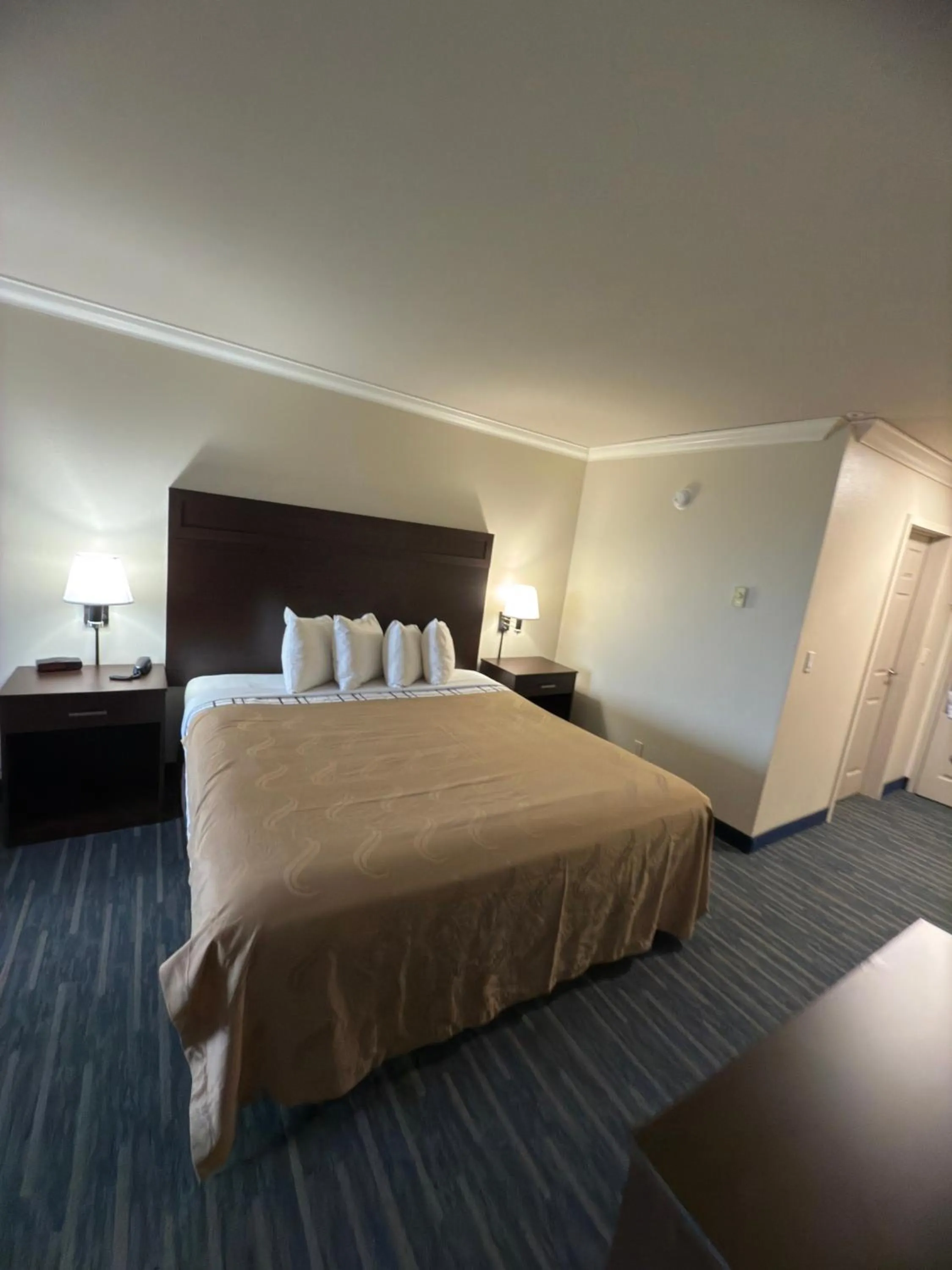 Bedroom, Bed in Coratel Inn and Suites By Jasper Ocean Shores