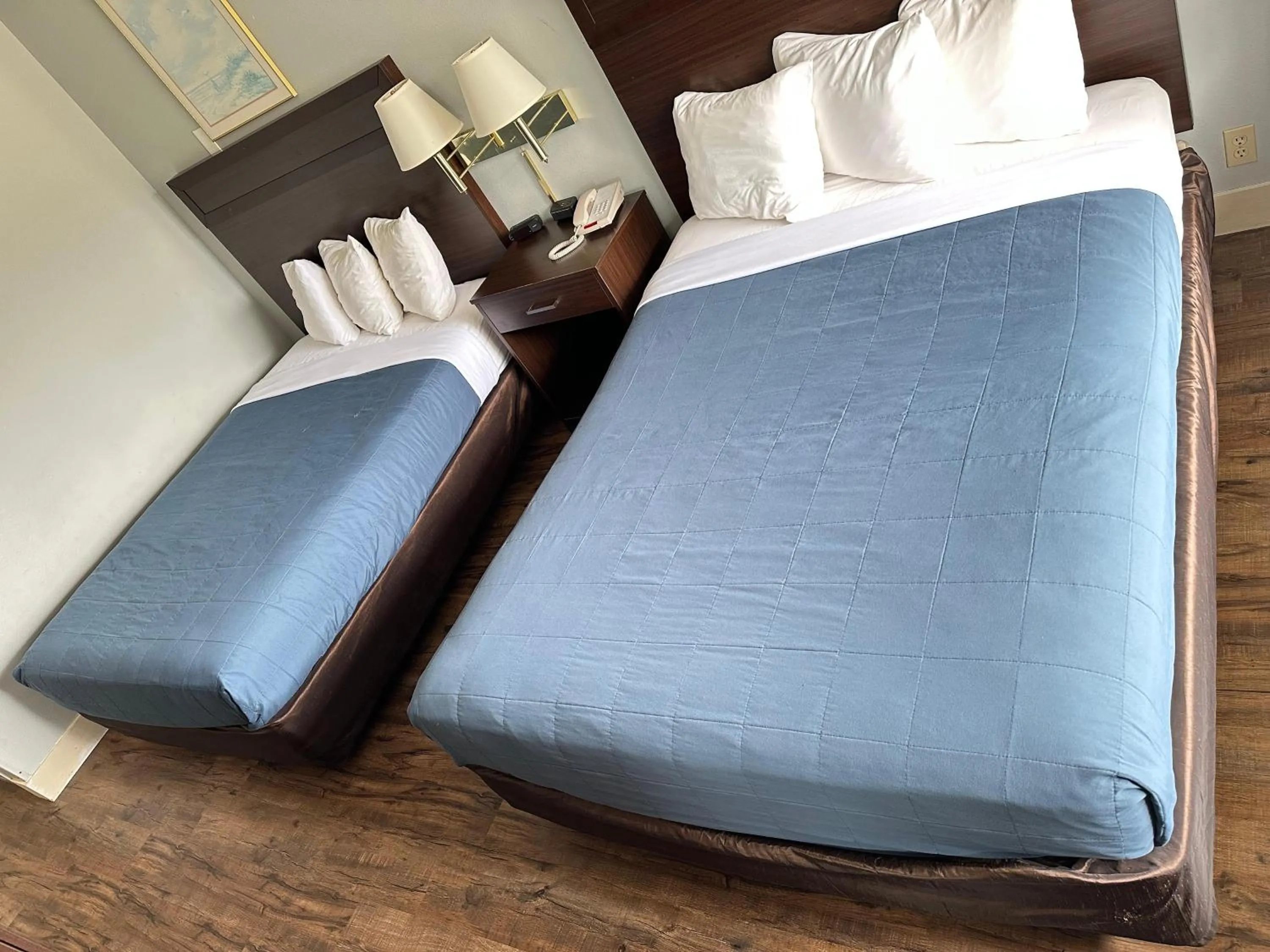 Bed in Coratel Inn and Suites By Jasper Ocean Shores