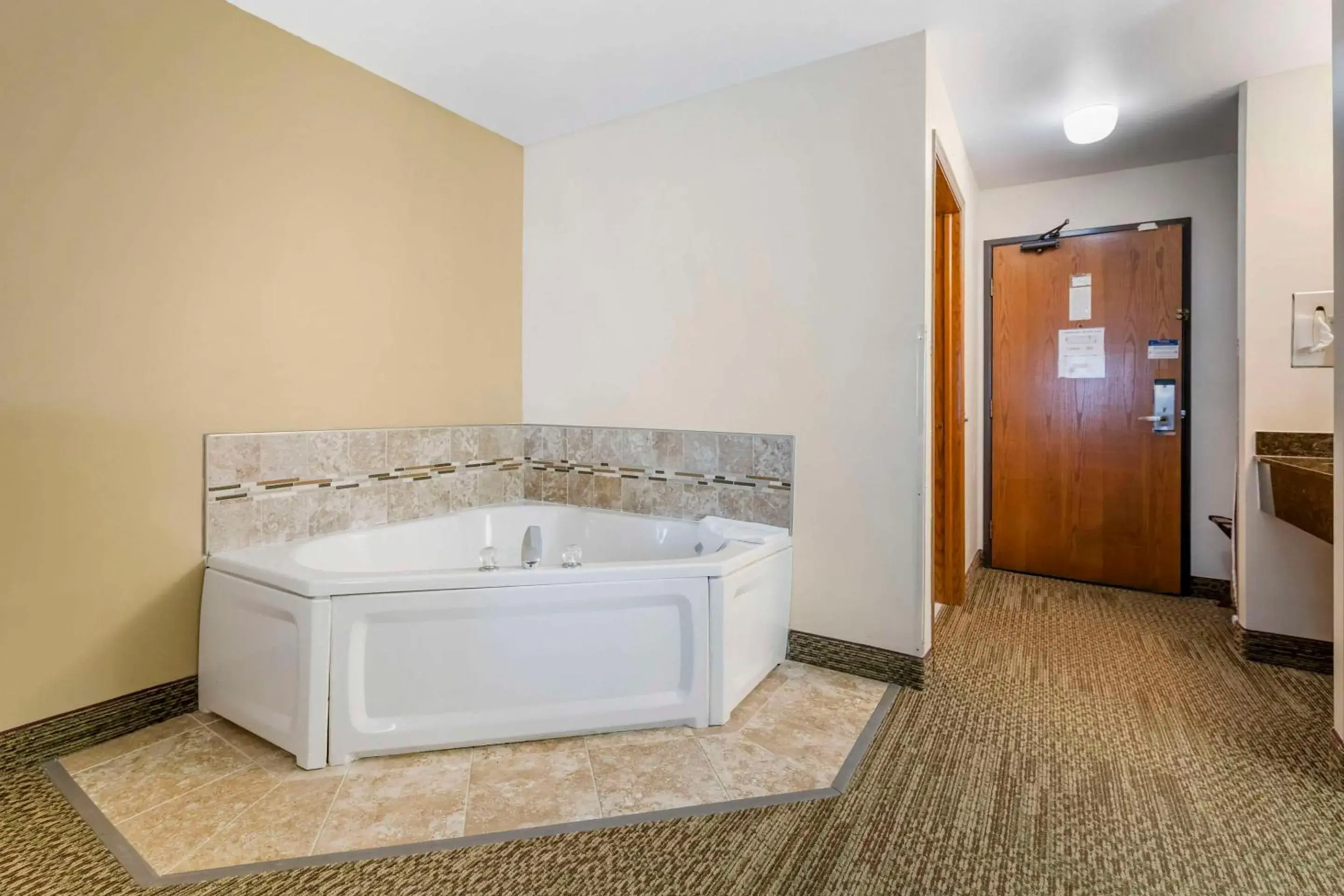 Bedroom in Quality Inn & Suites Stoughton - Madison South Bedroom in Quality Inn & Suites Stoughton - Madison South