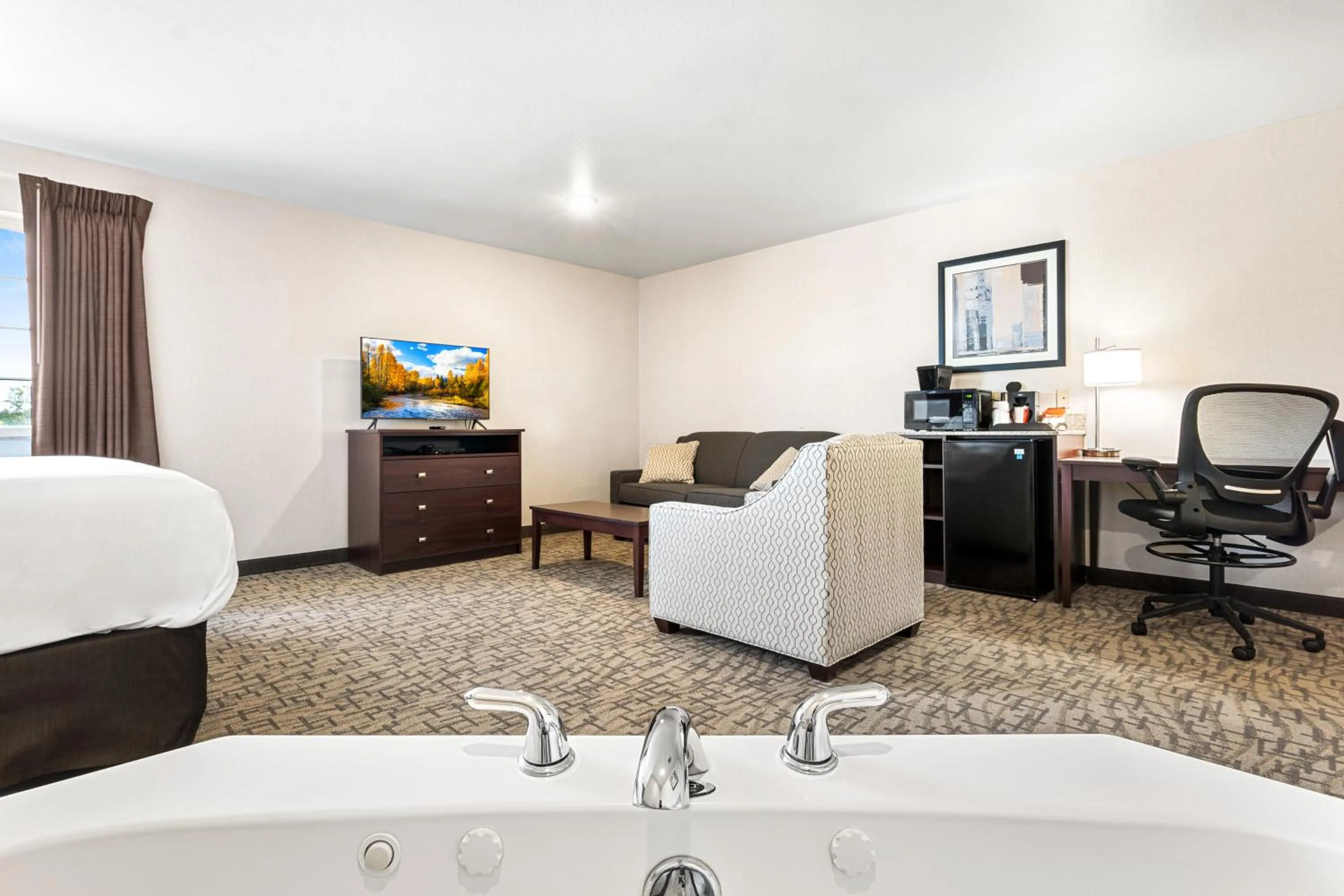 Seating area in Boarders Inn & Suites by Cobblestone Hotels - Shawano