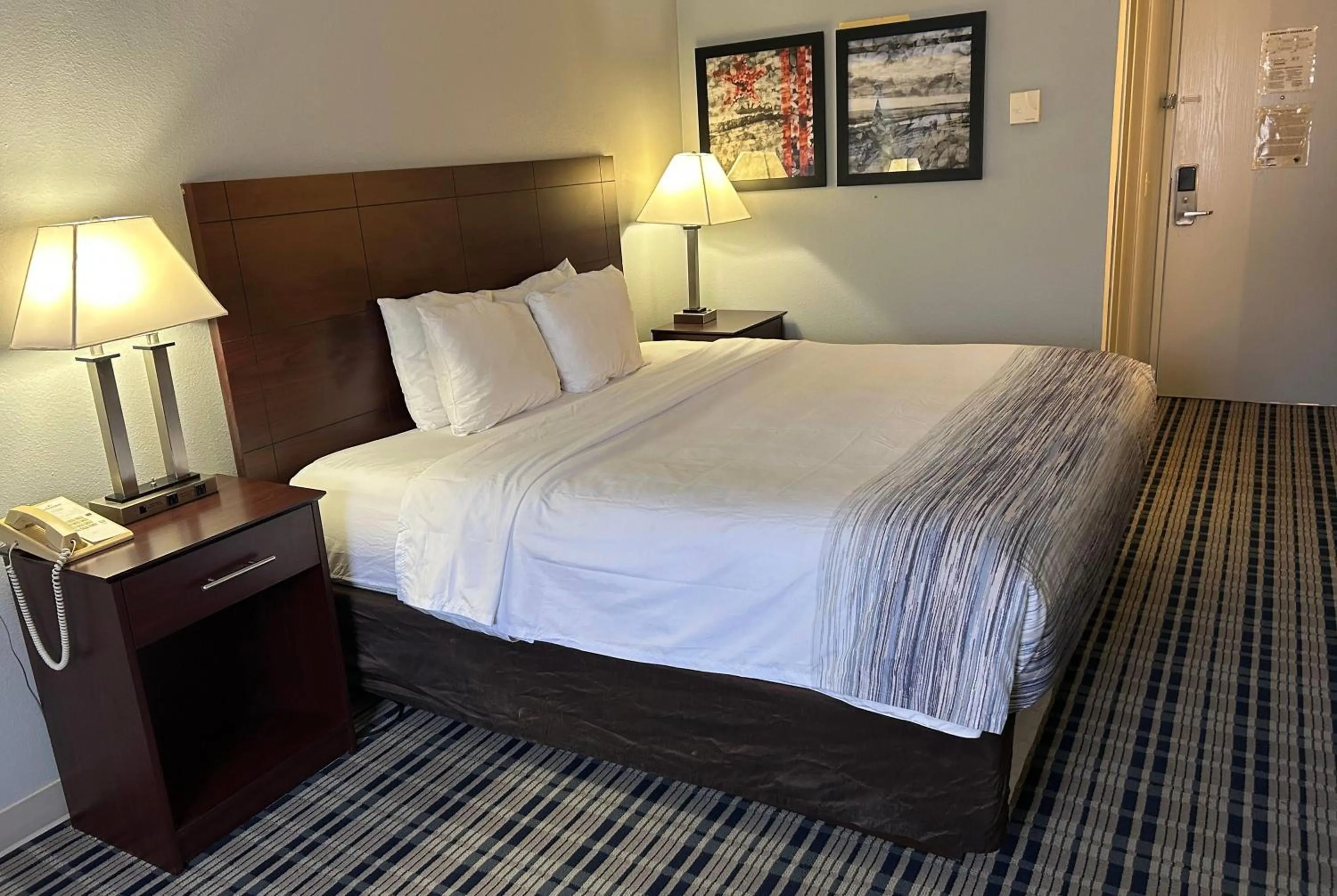 Photo of the whole room, Bed in AmericInn by Wyndham Mosinee Central Wisconsin Airport