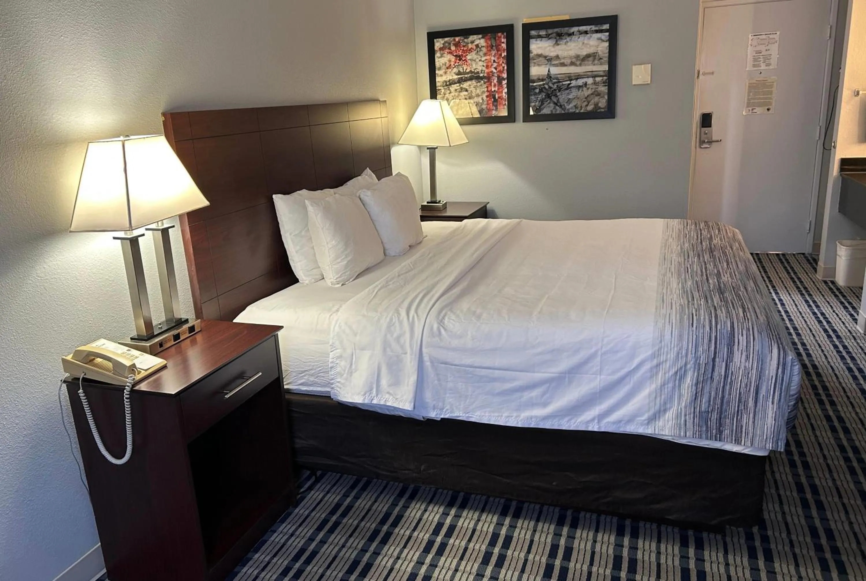 Photo of the whole room, Bed in AmericInn by Wyndham Mosinee Central Wisconsin Airport