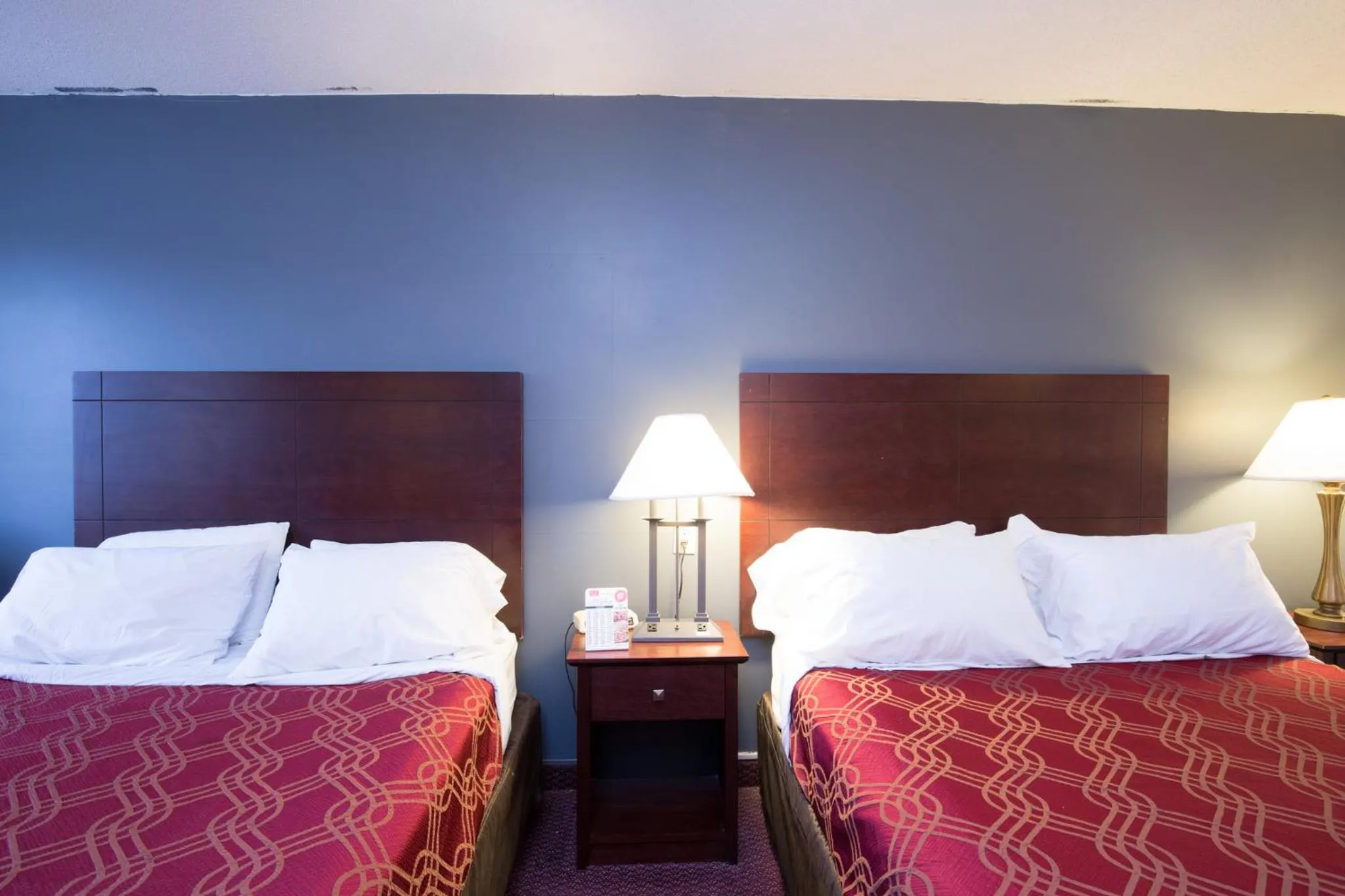 Bedroom, Bed in Travelodge by Wyndham Merrill