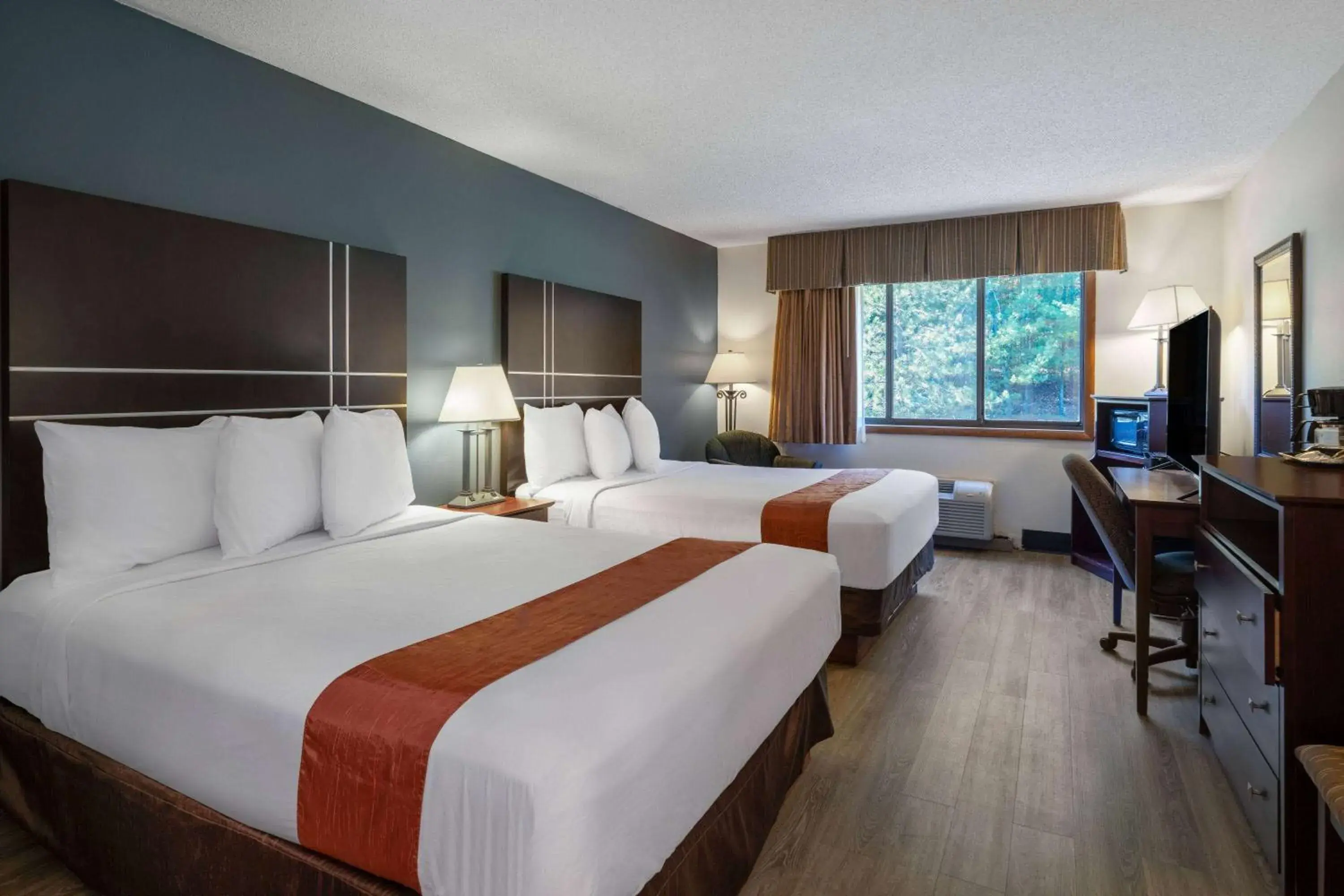 Queen Room with Two Queen Beds - Non-Smoking in Travelodge by Wyndham Merrill Queen Room with Two Queen Beds - Non-Smoking in Travelodge by Wyndham Merrill