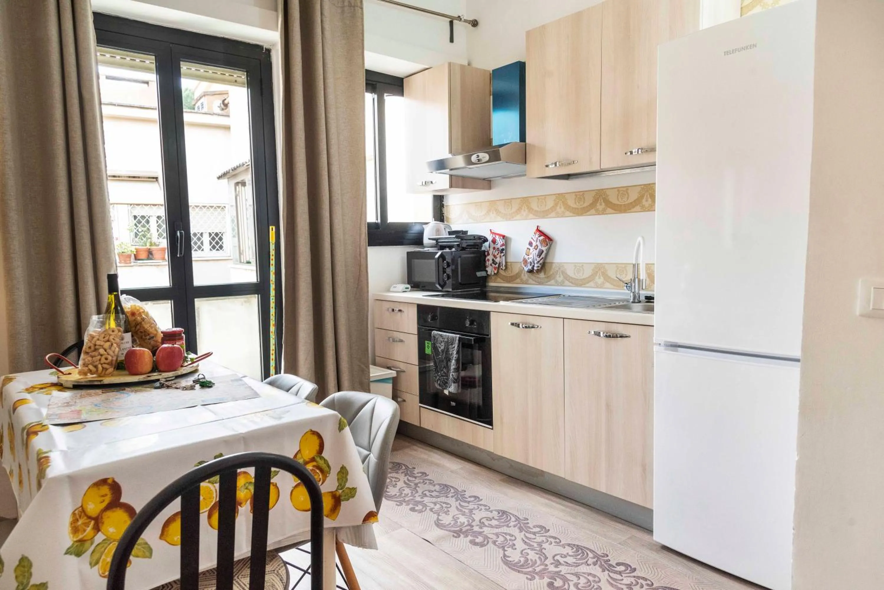 Kitchen or kitchenette in Merulana Suite S.Peter