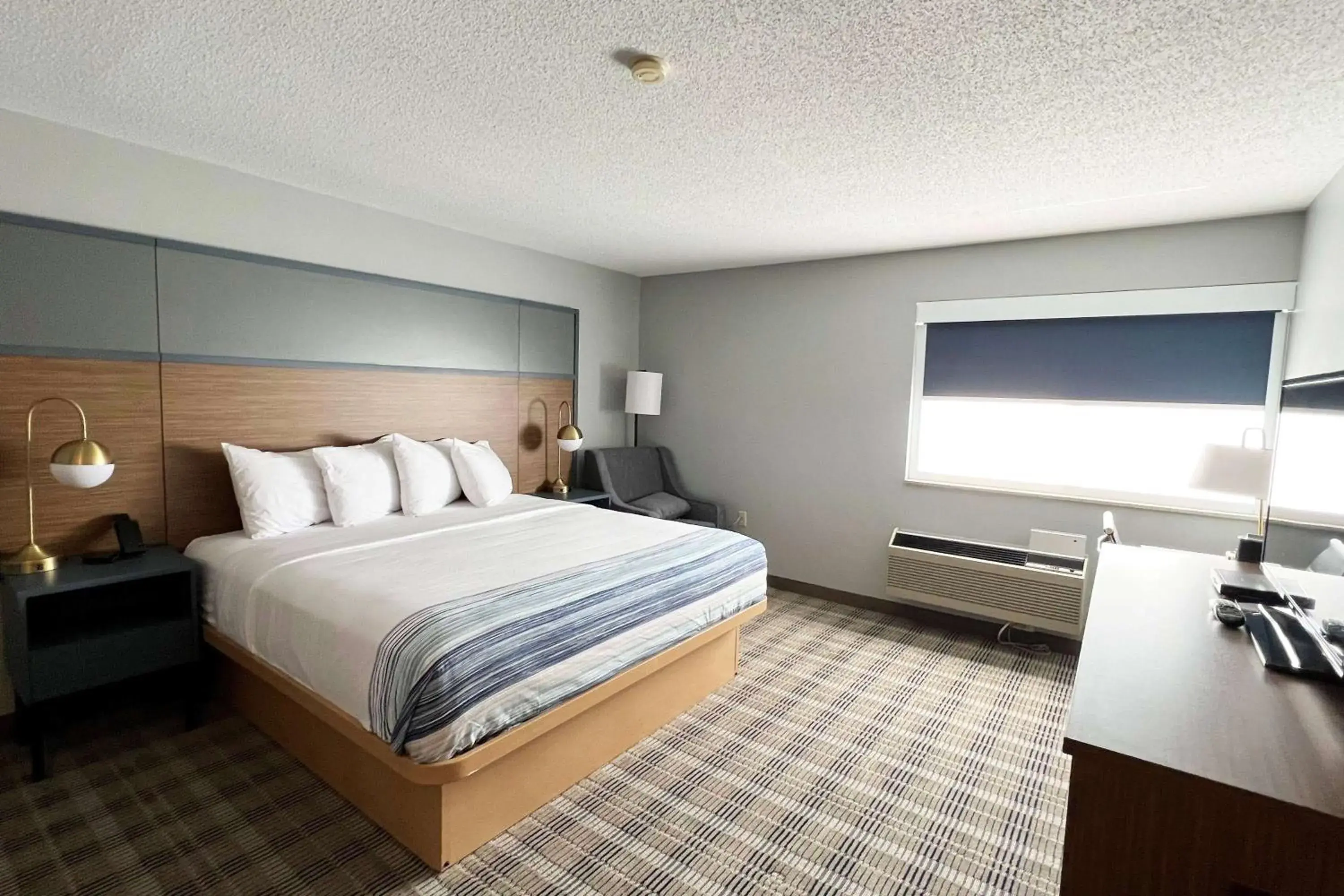 Photo of the whole room, Bed in AmericInn by Wyndham Marshfield