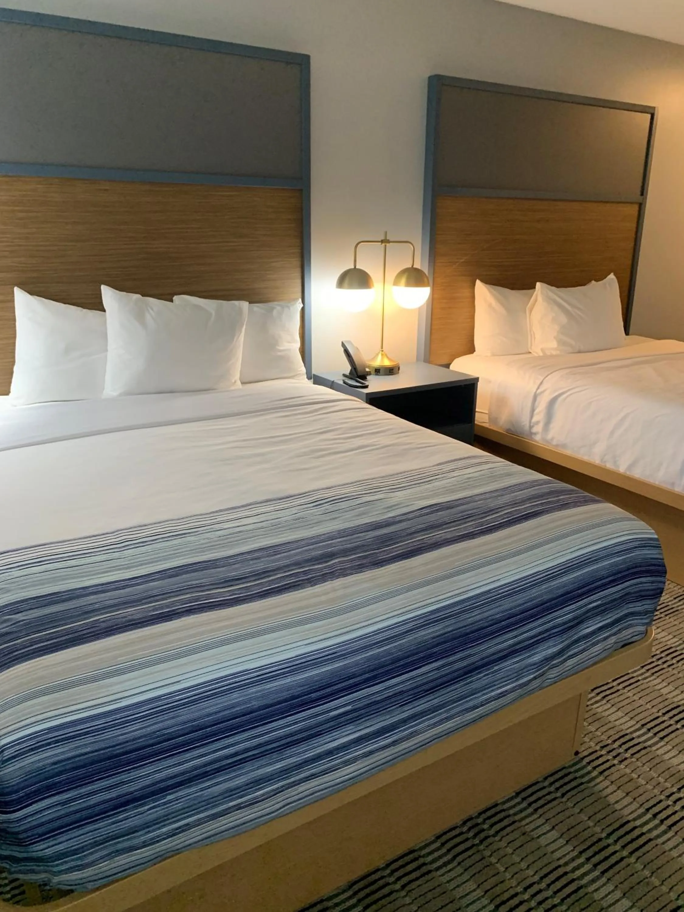 Bedroom, Bed in AmericInn by Wyndham Marshfield