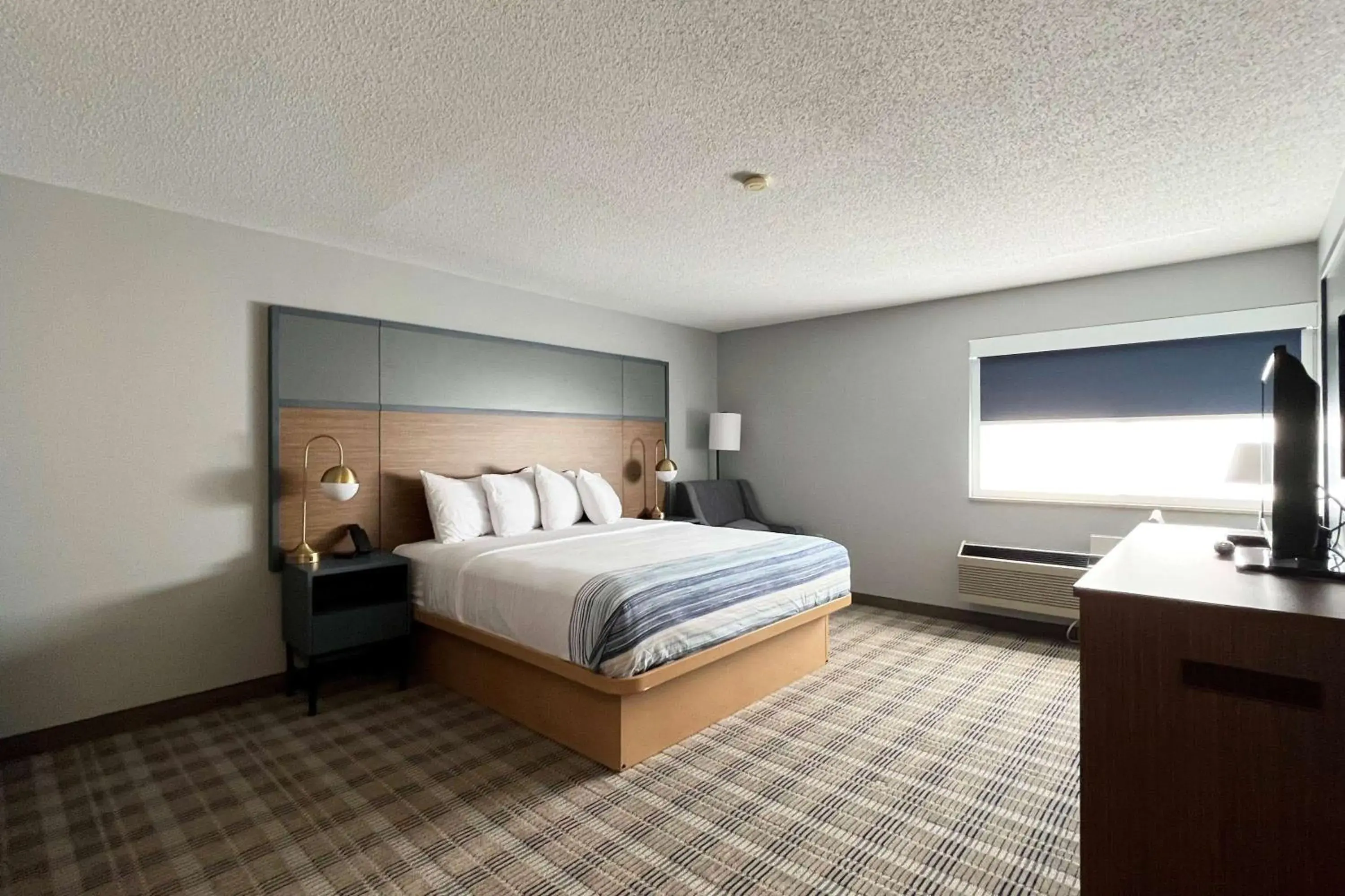 Photo of the whole room, Bed in AmericInn by Wyndham Marshfield