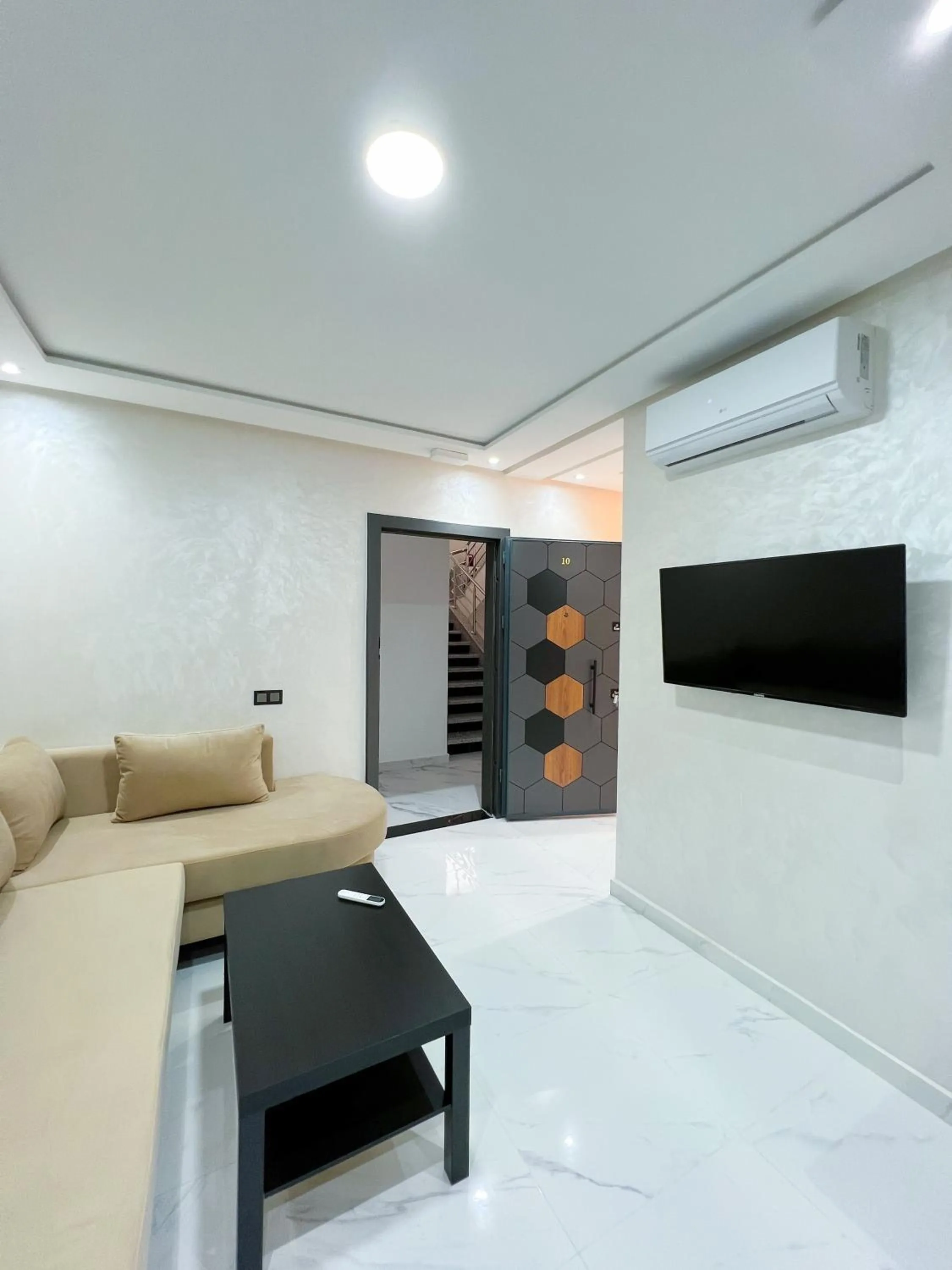 Communal lounge/ TV room, Bed in Royal Rif Alhoceima