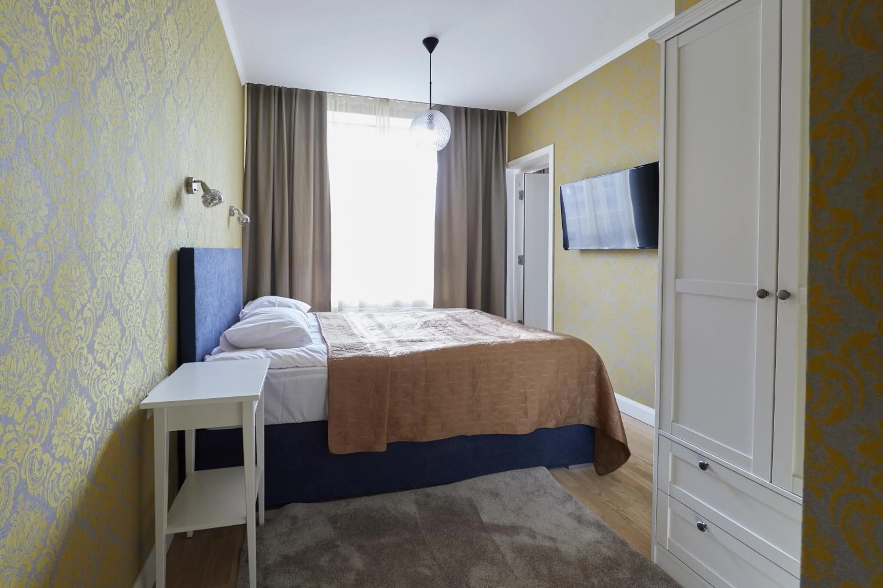 Bed in Rohuaia Apartments