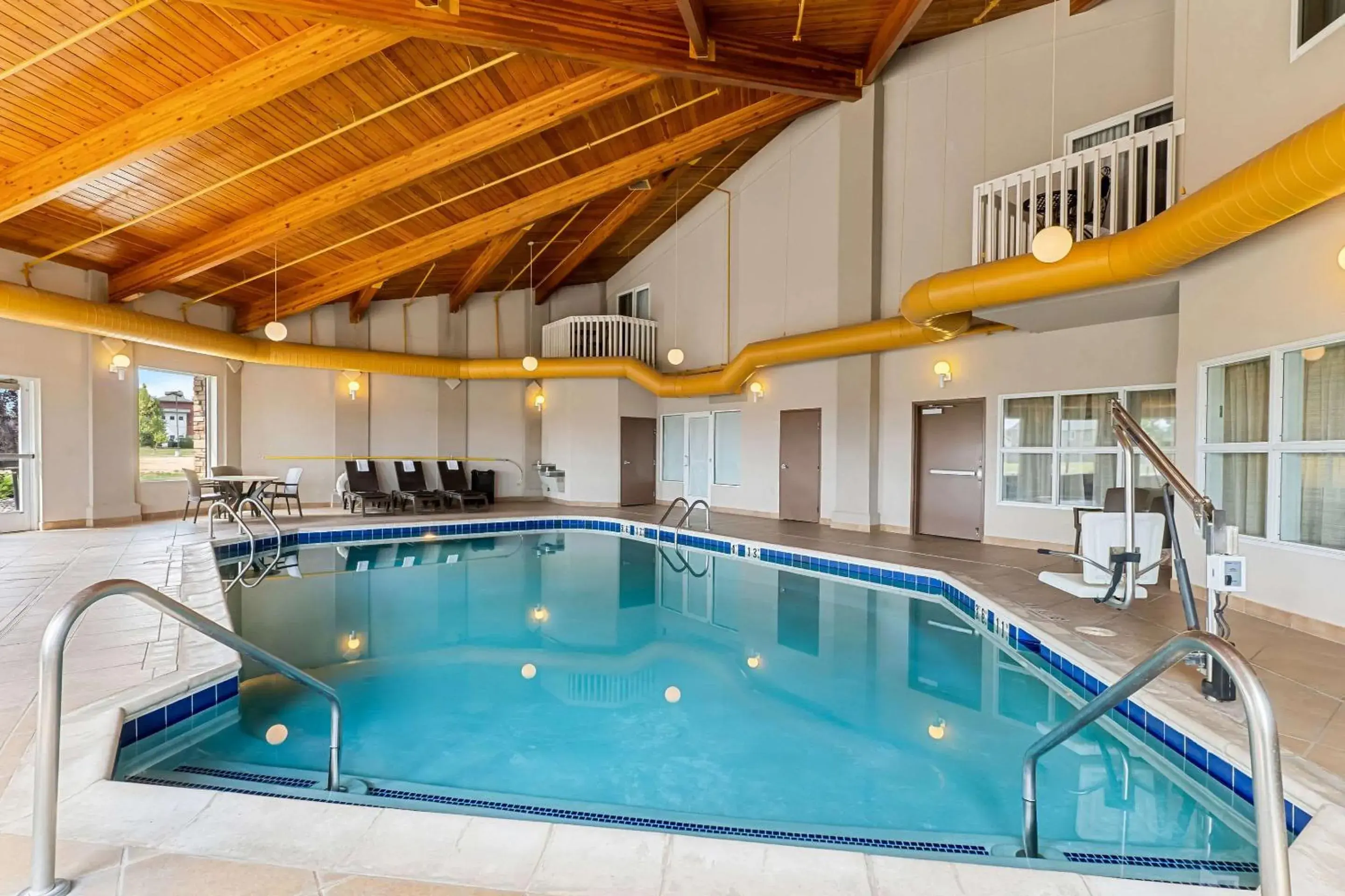 Bedroom in Comfort Inn & Suites Near University of Wyoming Bedroom in Comfort Inn & Suites Near University of Wyoming