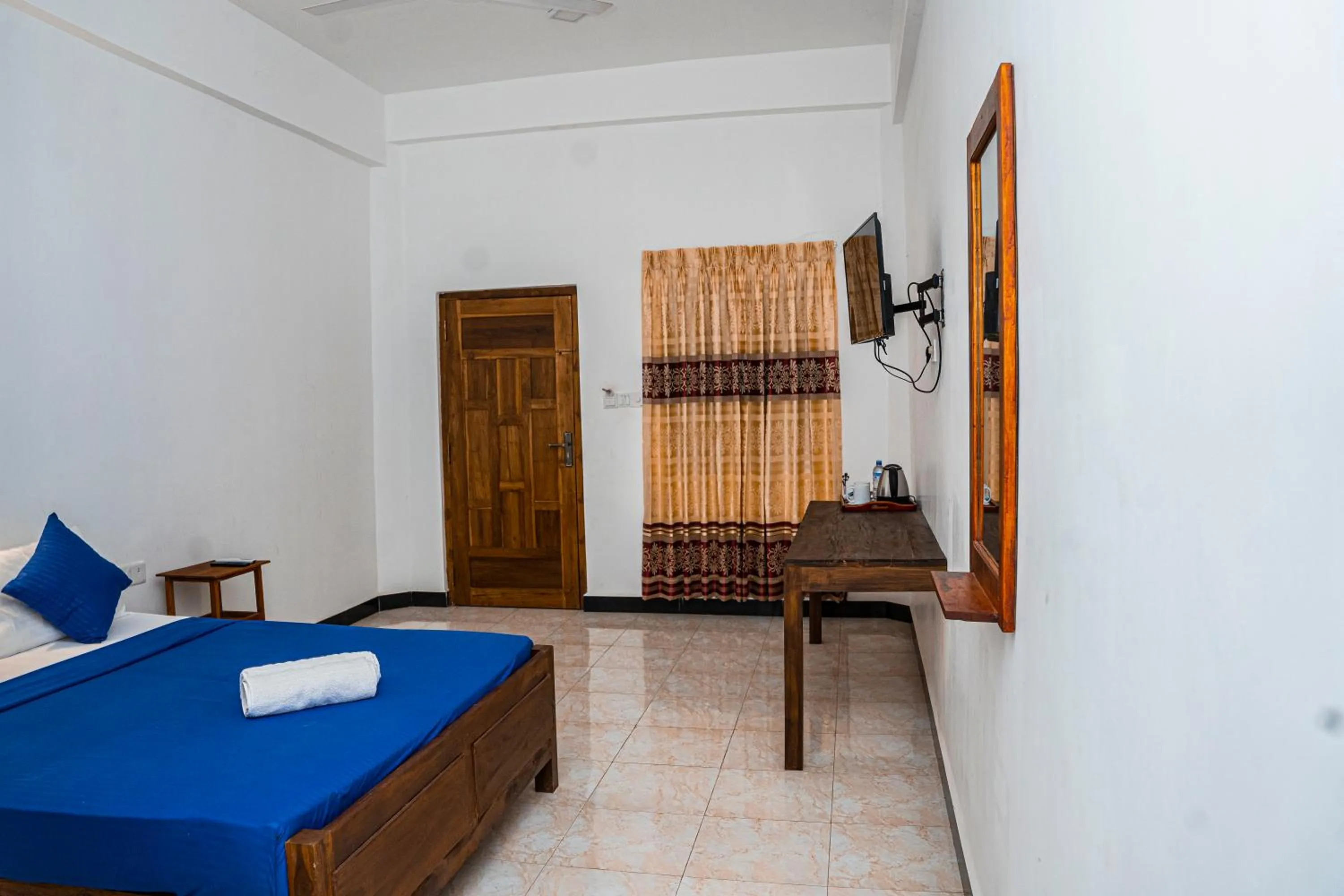 Bed in Theevanni Resort