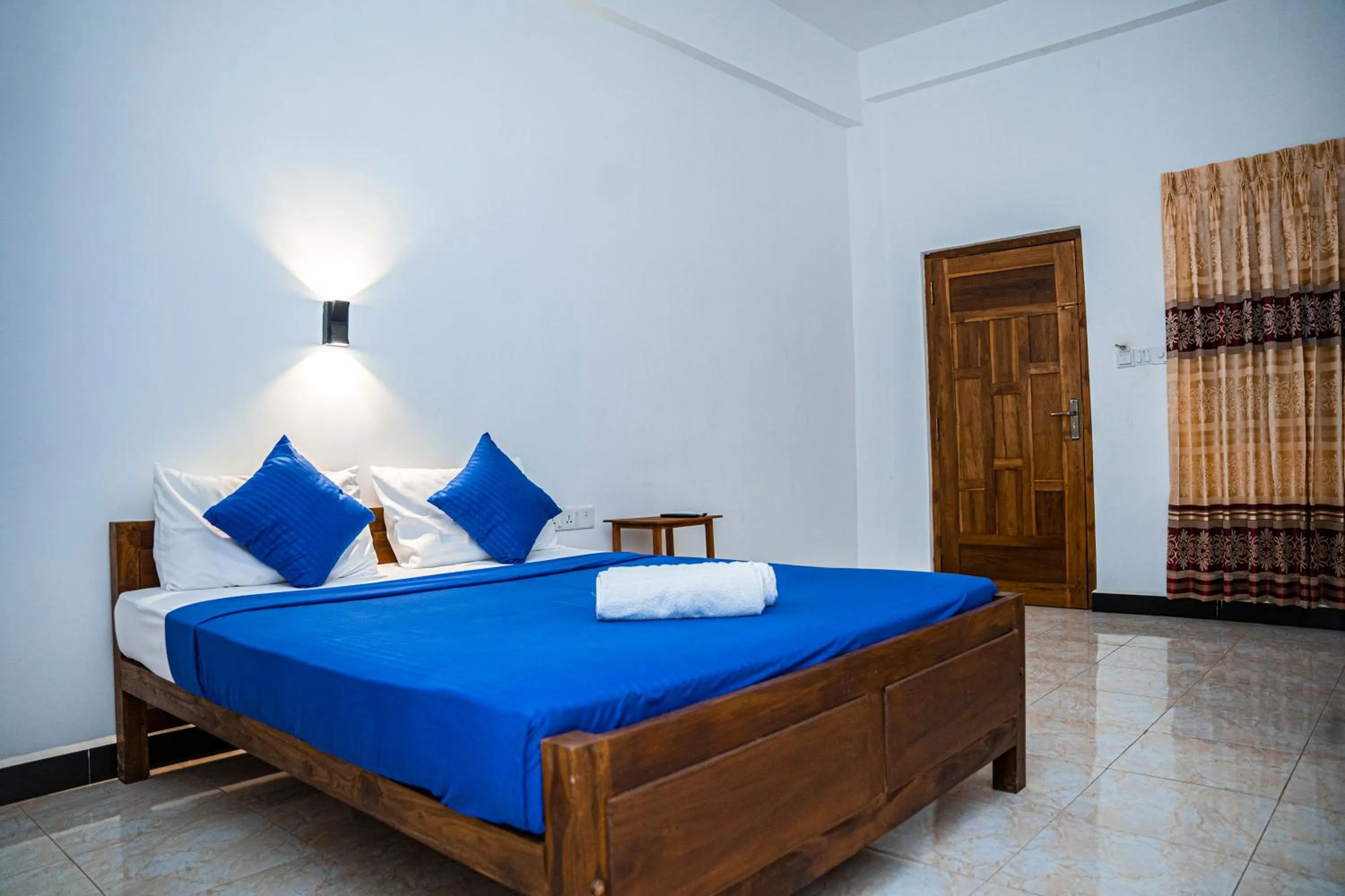 Bed in Theevanni Resort