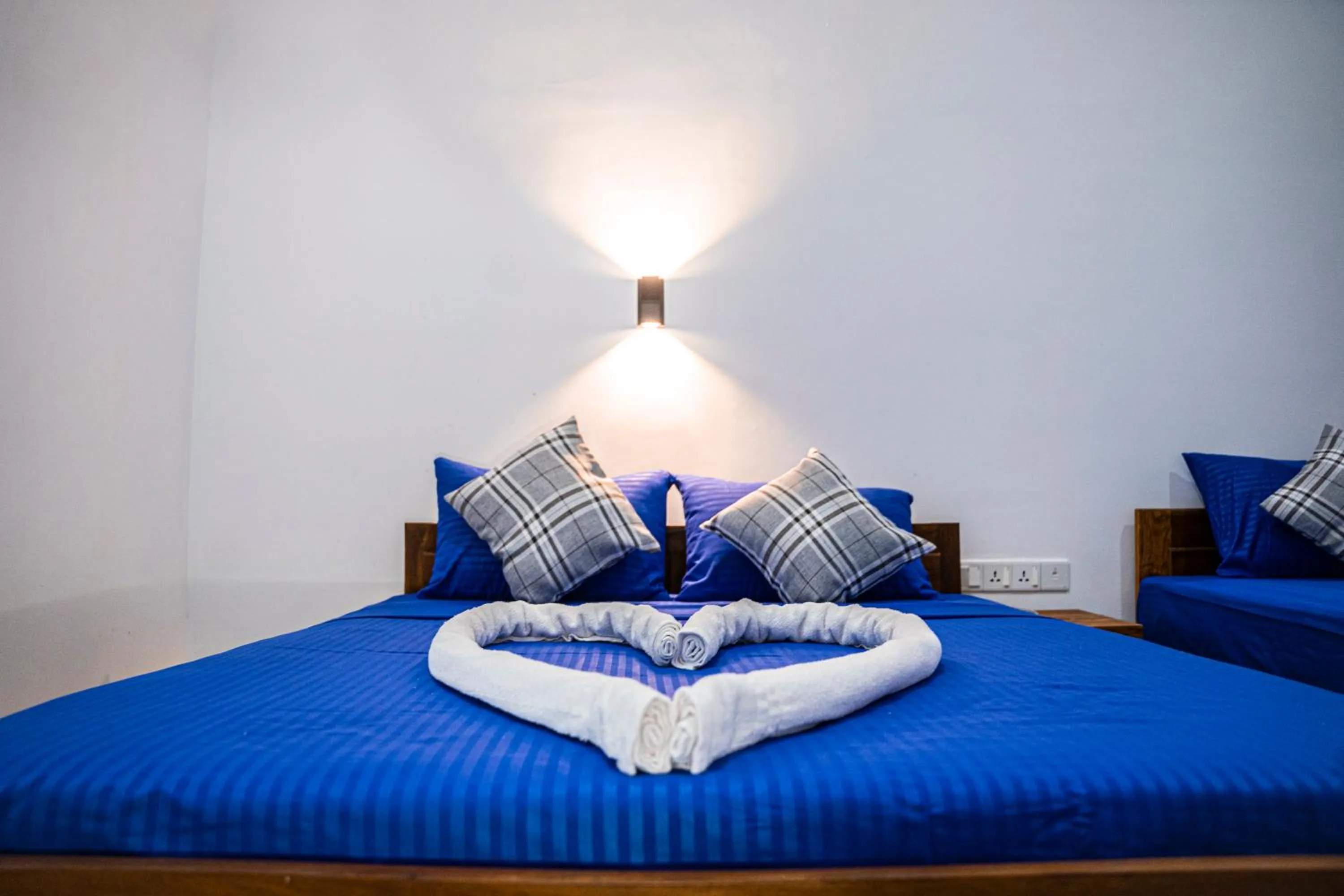 Bed in Theevanni Resort