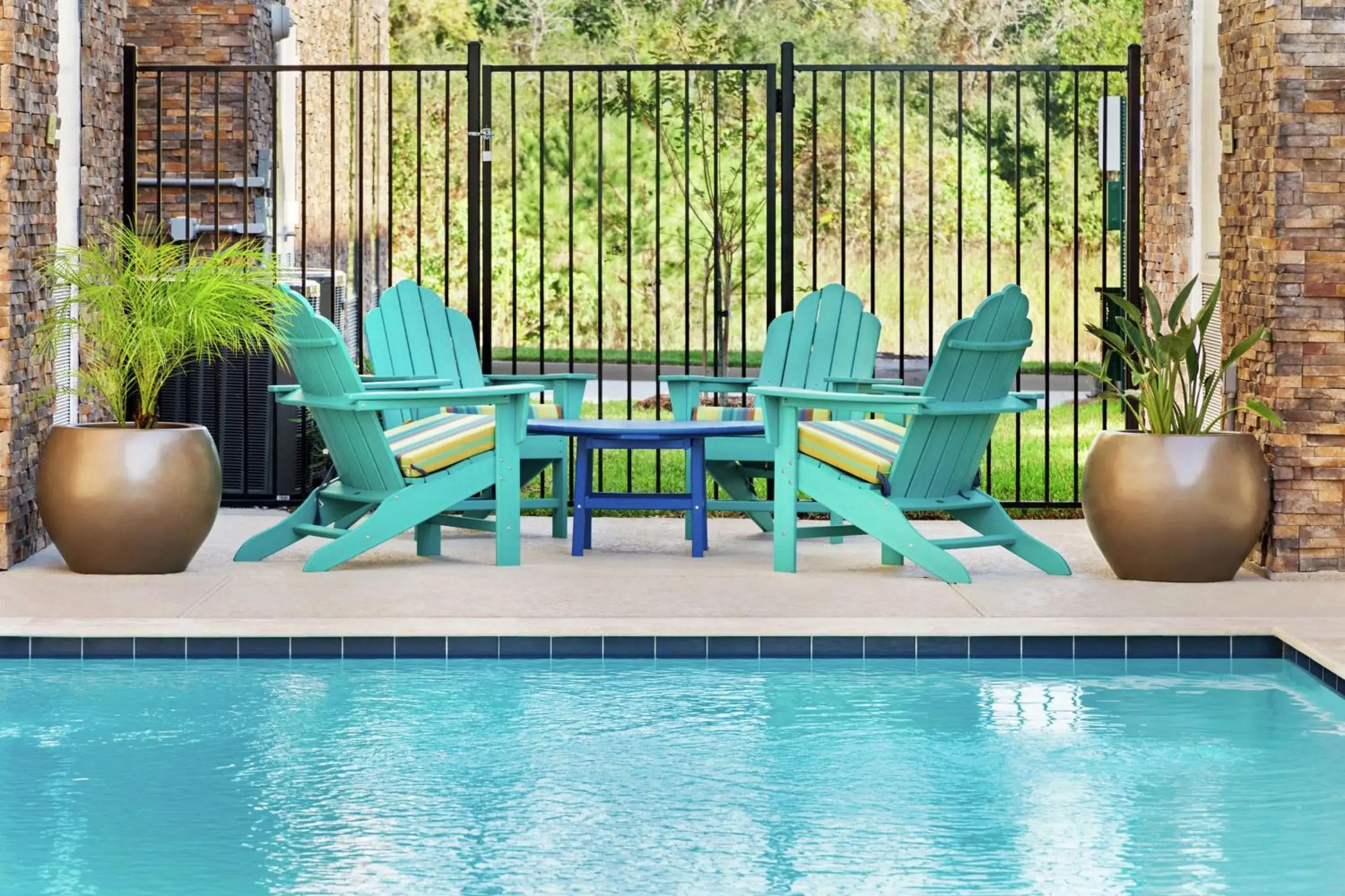 Pool view in Home2 Suites By Hilton Houston-Pearland, Tx Pool view in Home2 Suites By Hilton Houston-Pearland, Tx