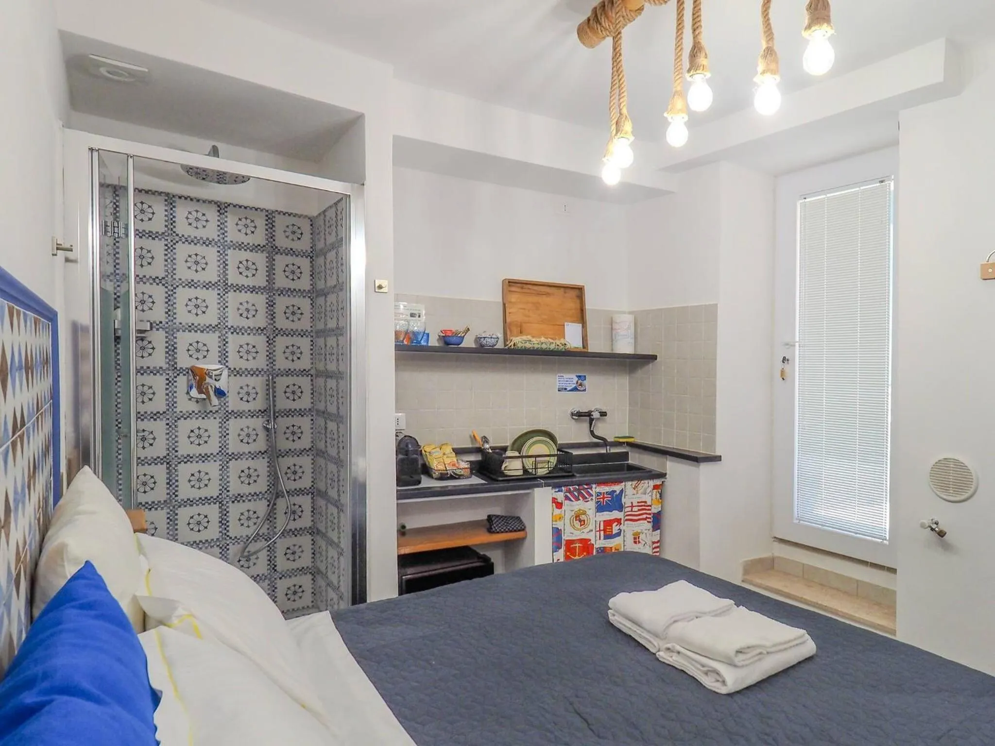 Bed in Ventu de Ma Studios & Rooms