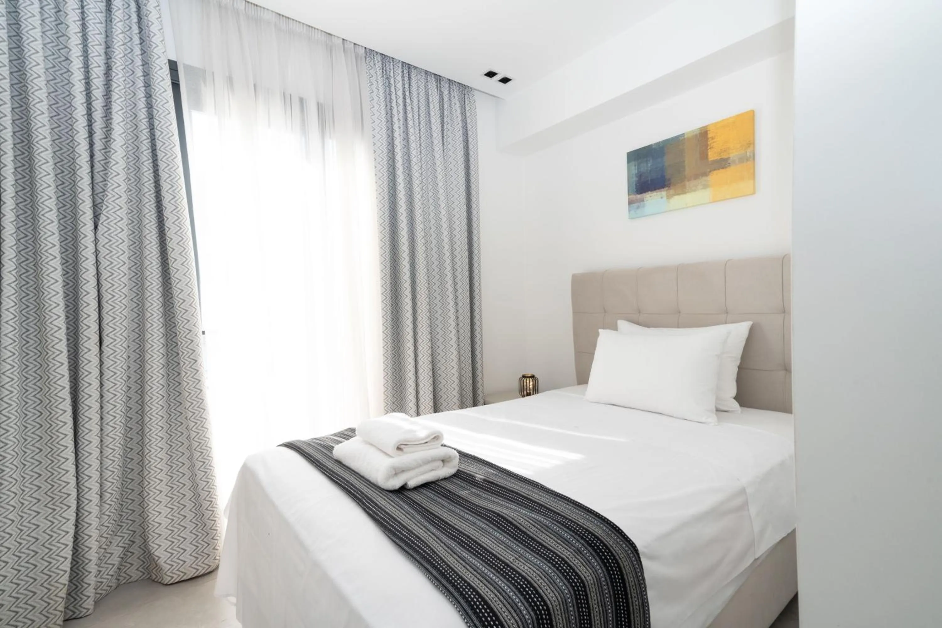 Bed in Heritage Boutique Apartments