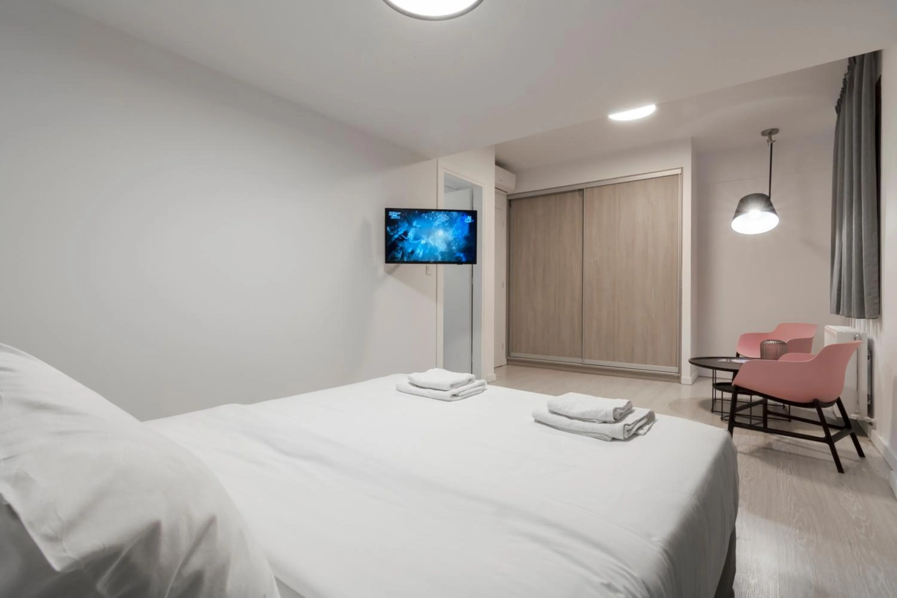 Bed in Heritage Boutique Apartments