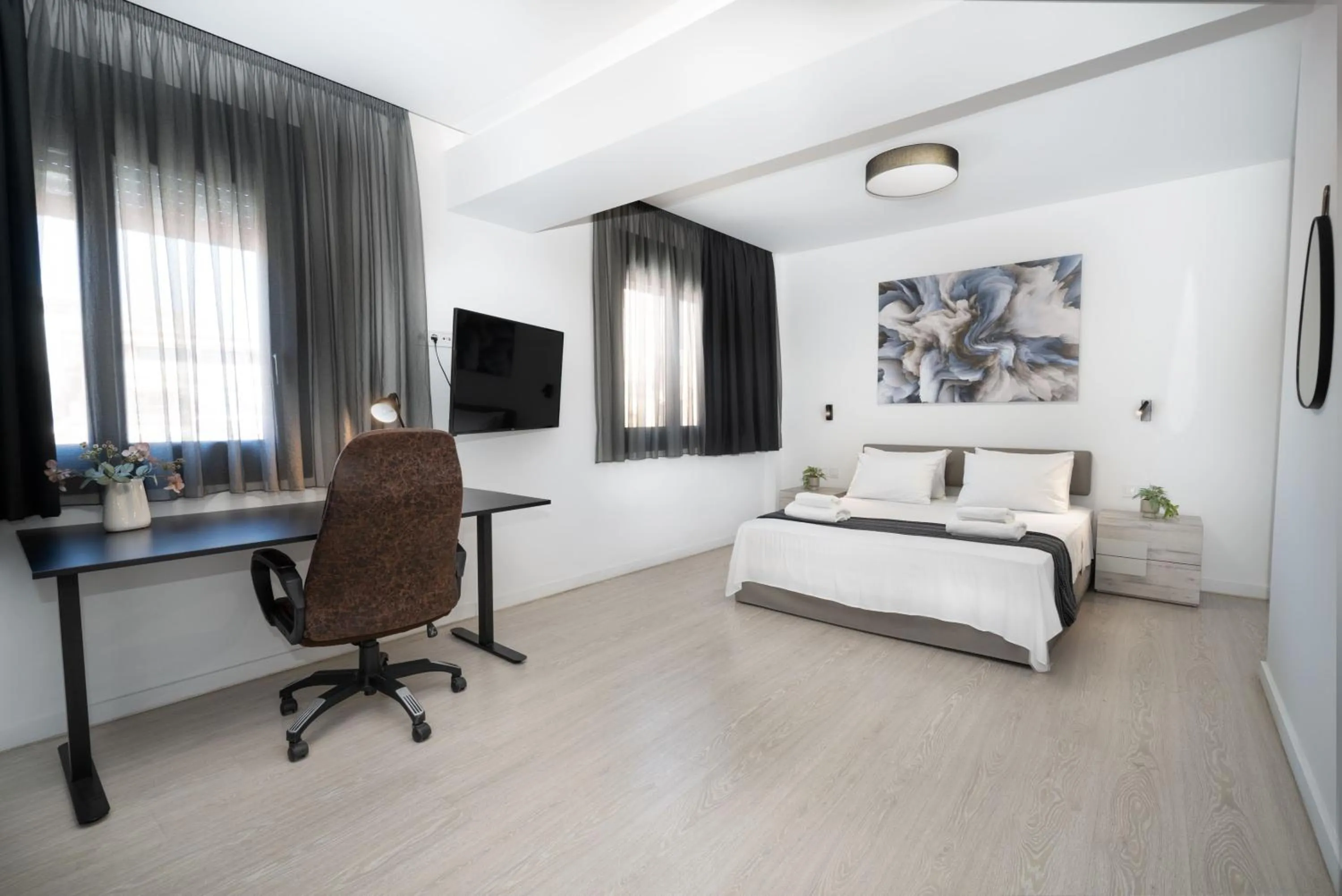 Bed in Heritage Boutique Apartments