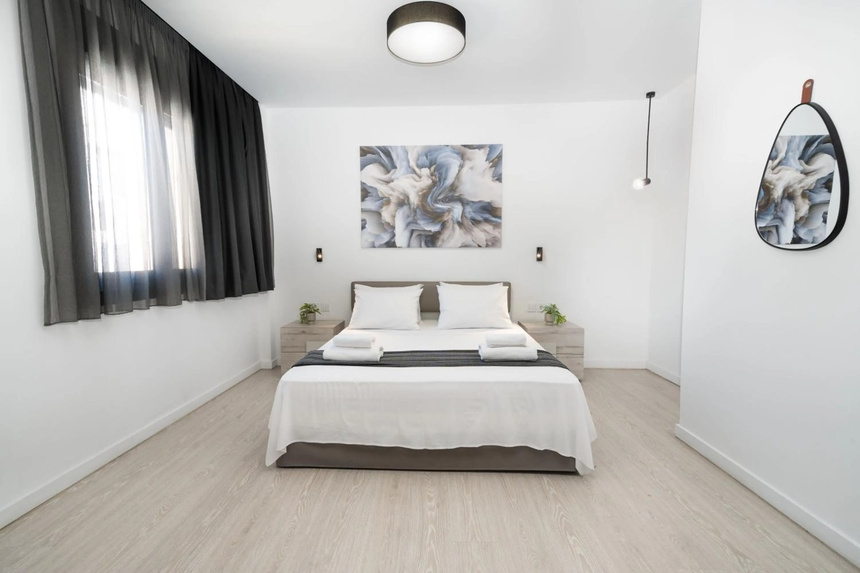 Bed in Heritage Boutique Apartments