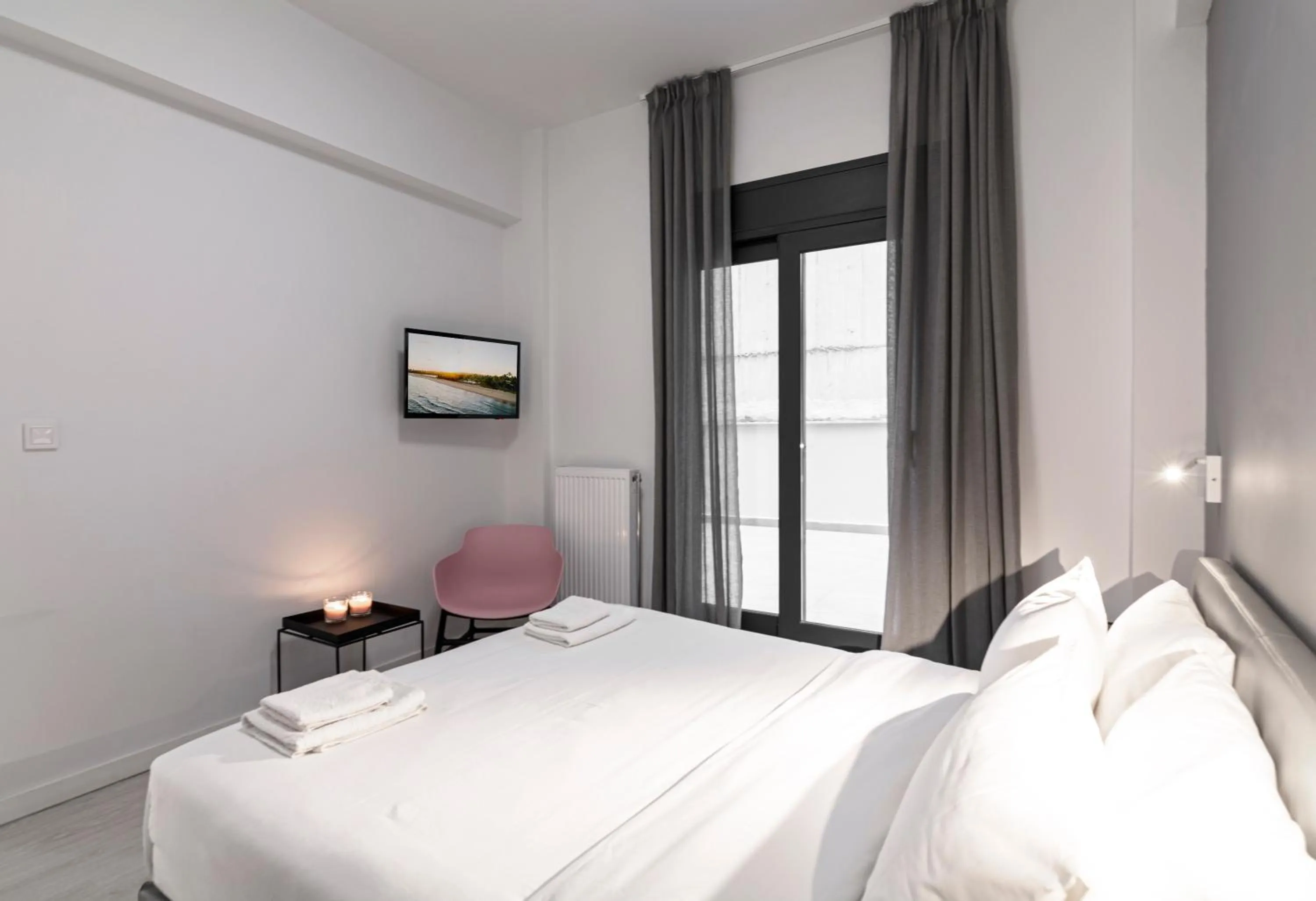 Bed in Heritage Boutique Apartments