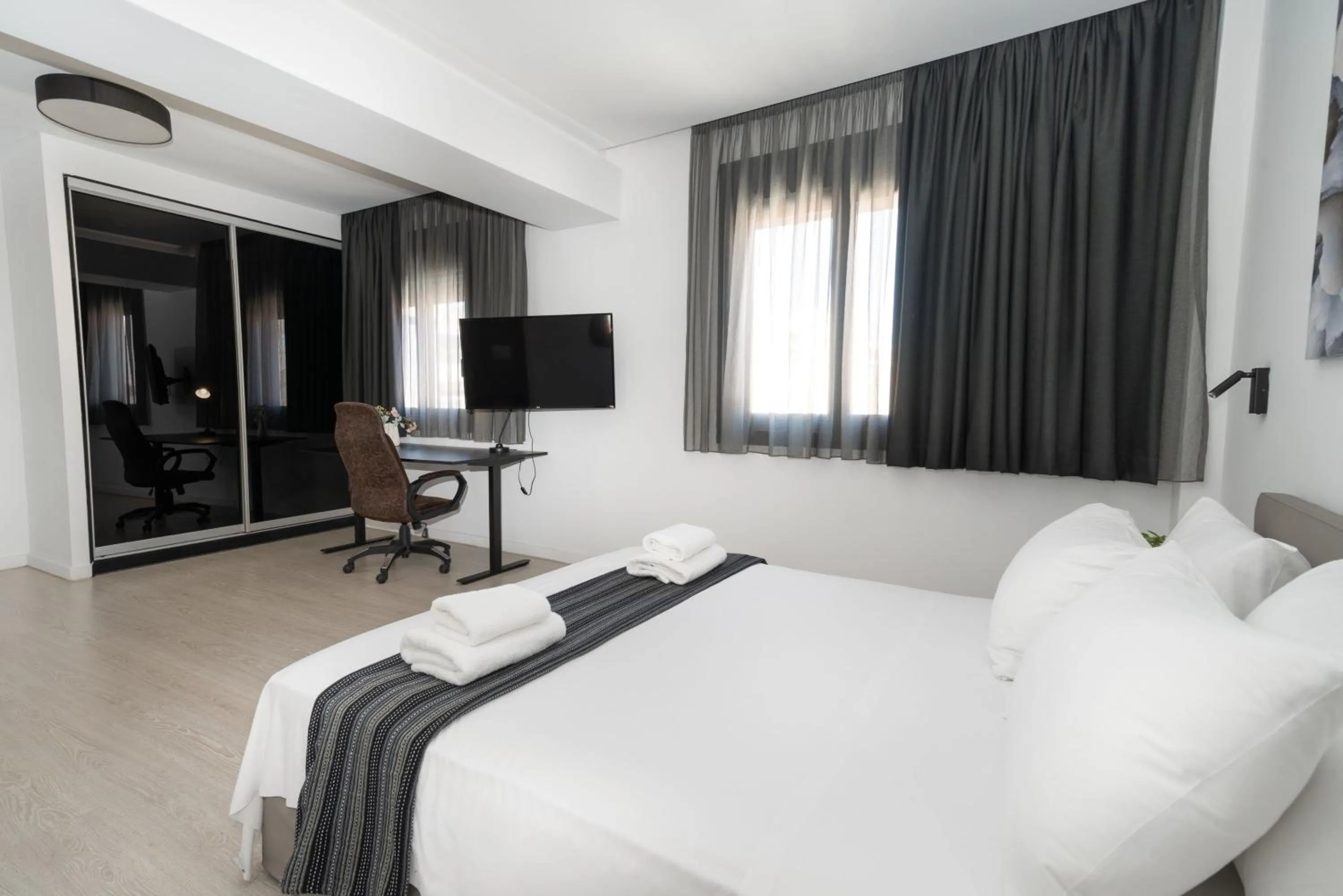 TV and multimedia, Bed in Heritage Boutique Apartments