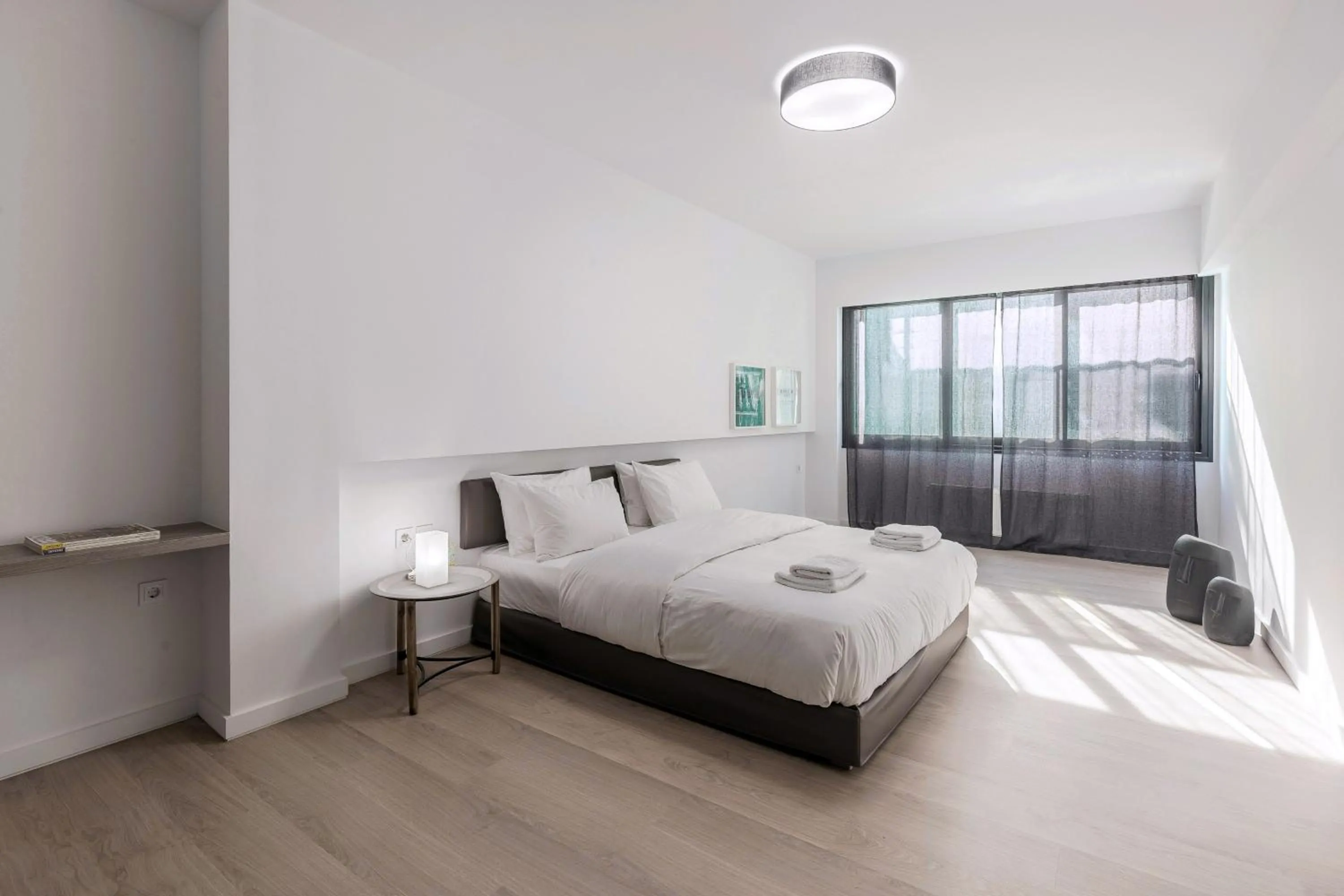 Bed in Heritage Boutique Apartments