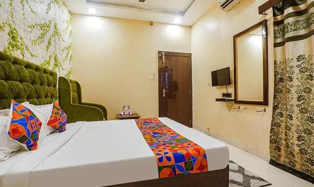 Photo of the whole room, Bed in The JK Hotel Nr Railway Station