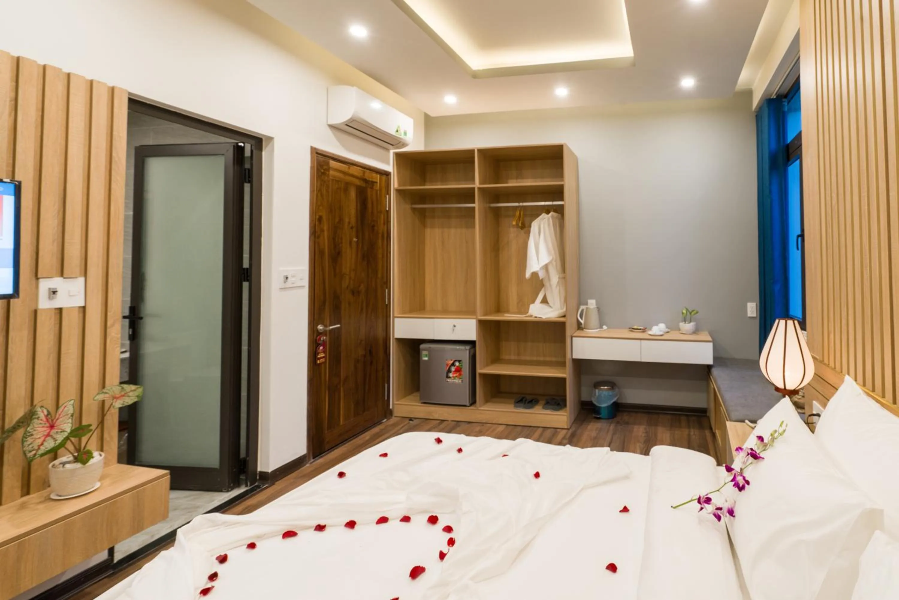 Photo of the whole room, Bed in Hoi An Grace River Villa
