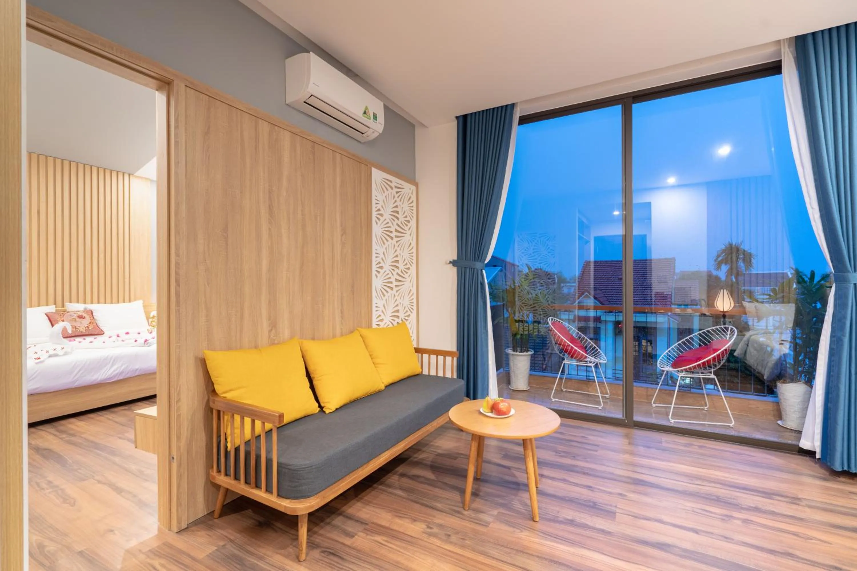 Living room, Bed in Hoi An Grace River Villa