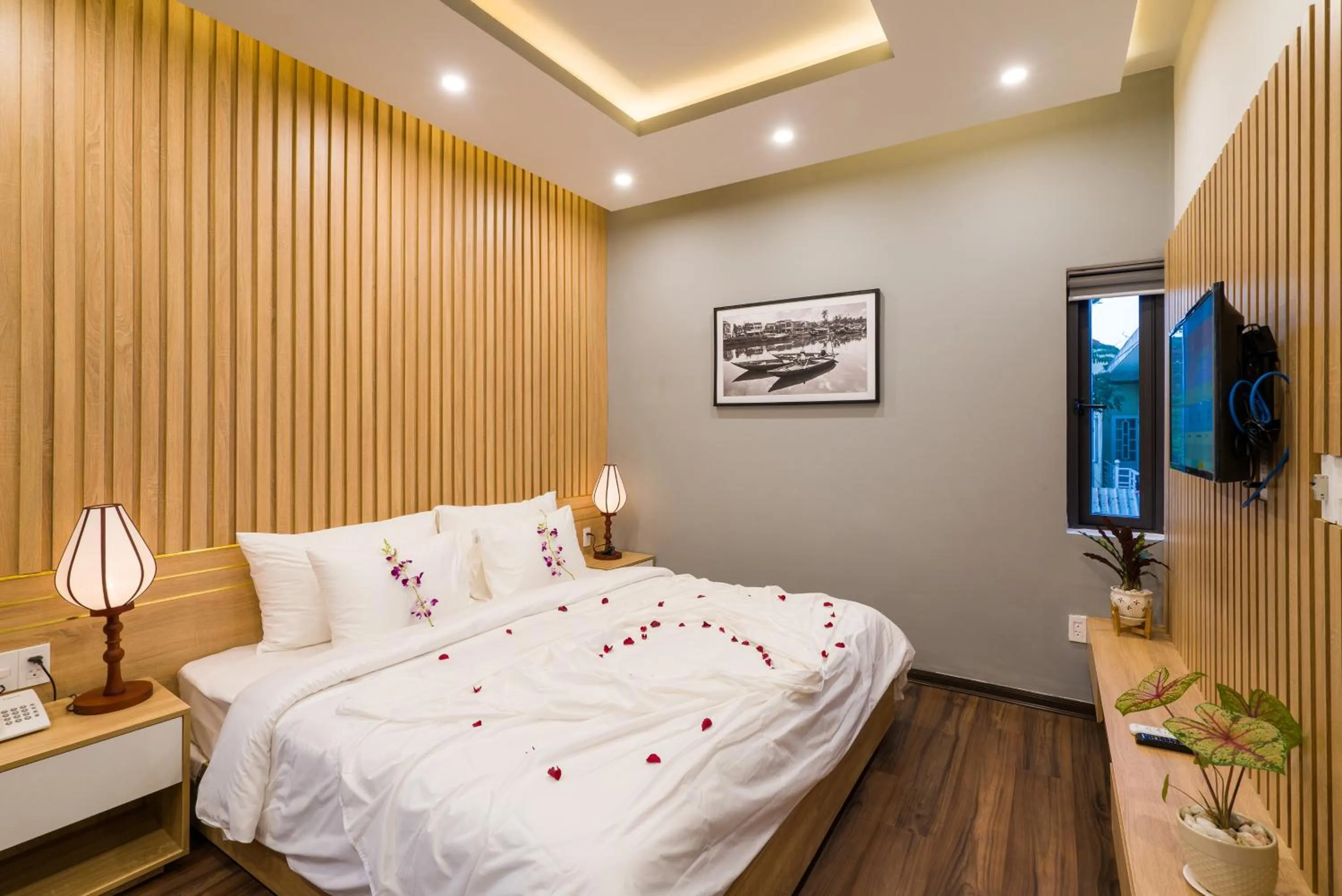 Photo of the whole room, Bed in Hoi An Grace River Villa