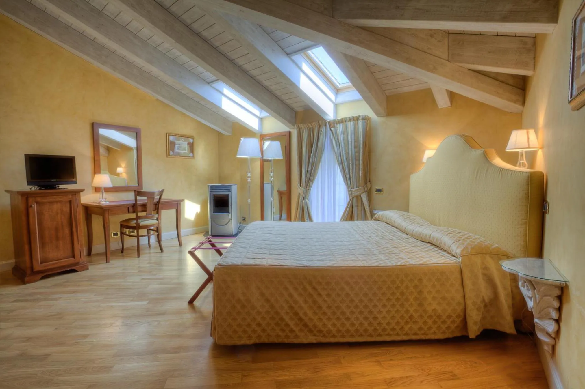 Bed in Relais La Colombara Spa & Wellness