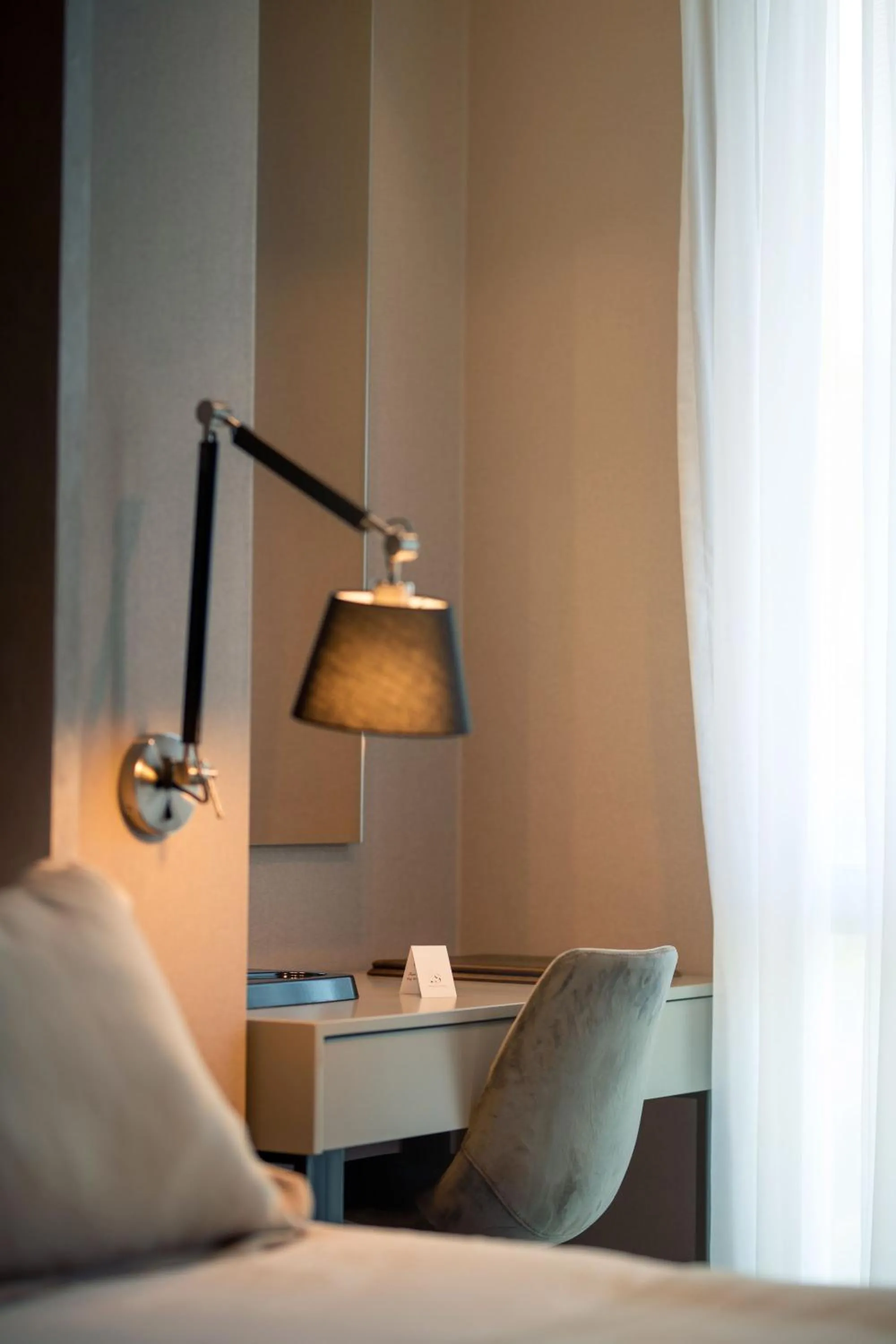 Seating area, Bed in Seraphine Plaza