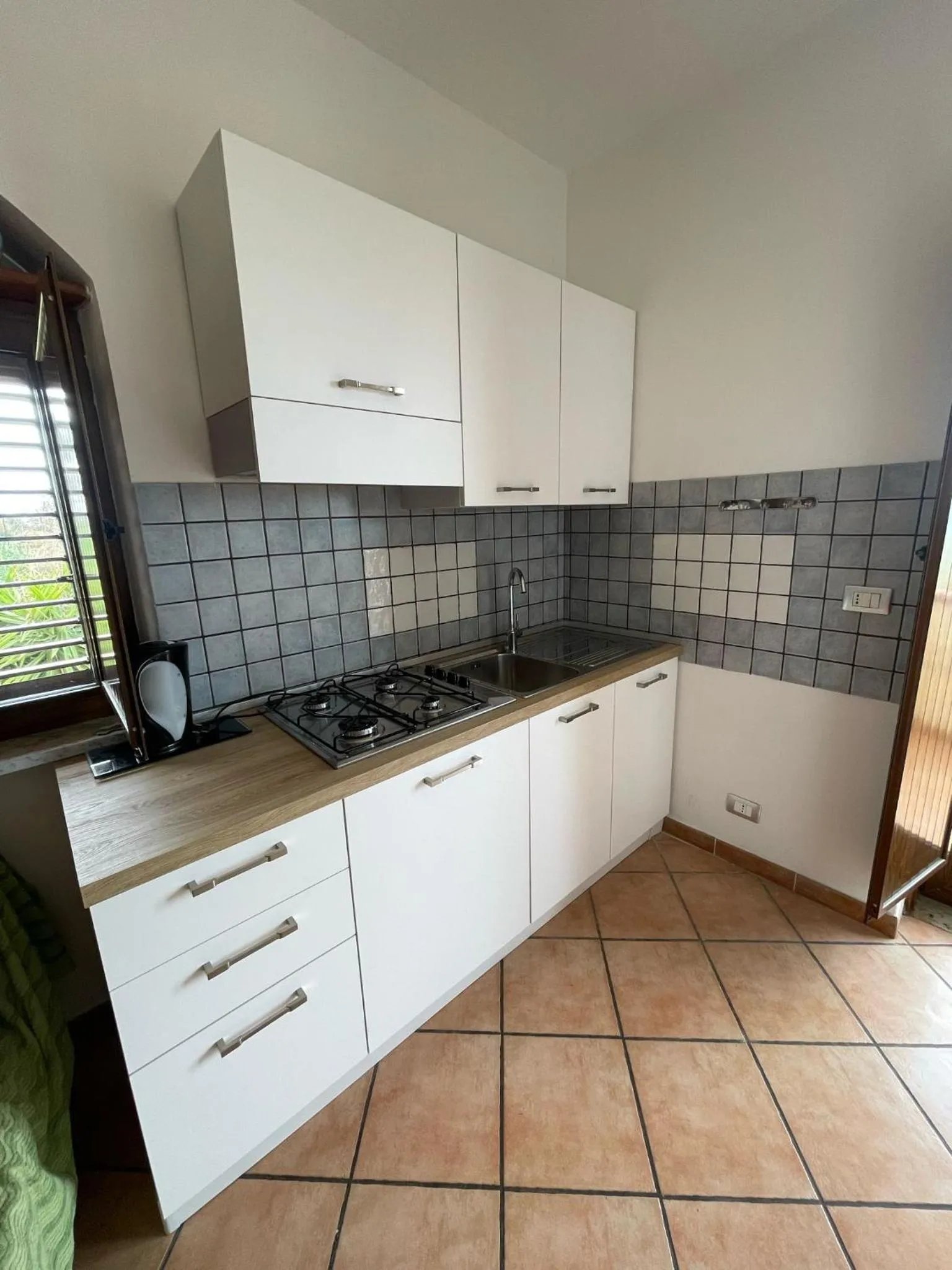 Kitchen or kitchenette in Appartamenti Pousada Michelino