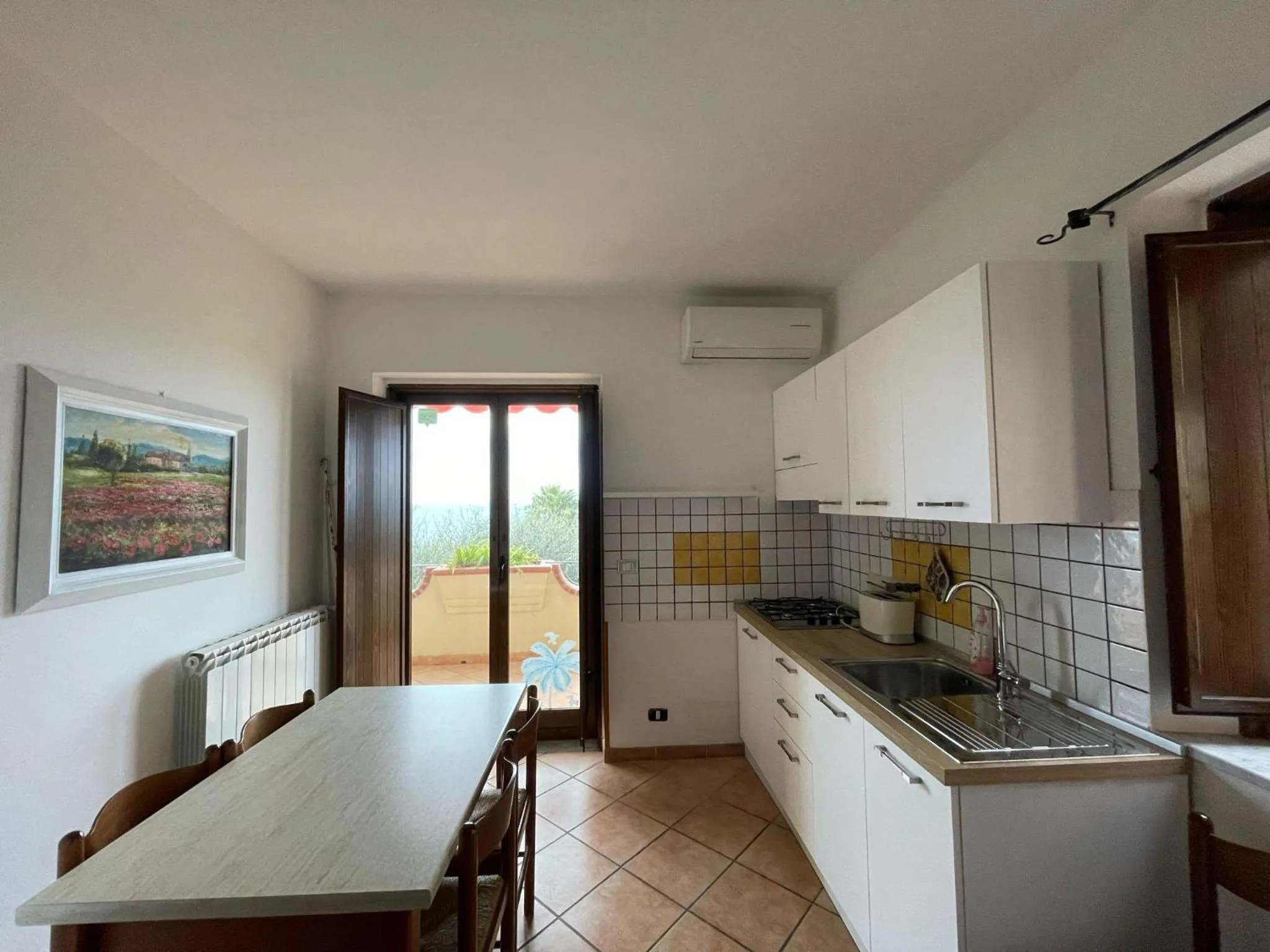 Kitchen or kitchenette in Appartamenti Pousada Michelino