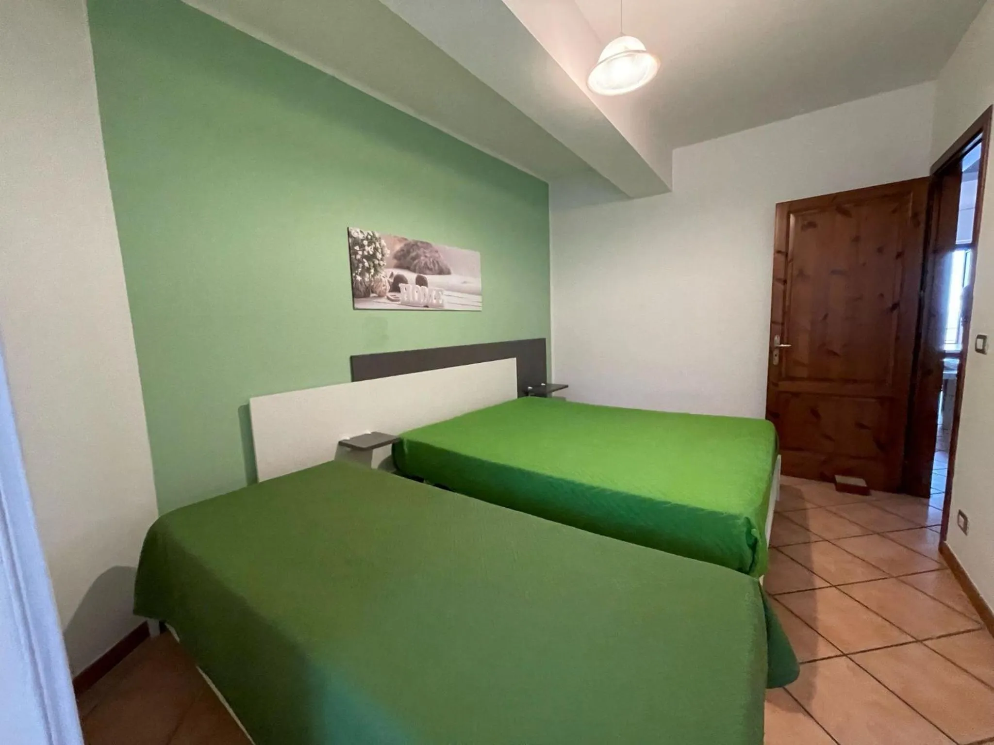 Bedroom, Bed in Appartamenti Pousada Michelino