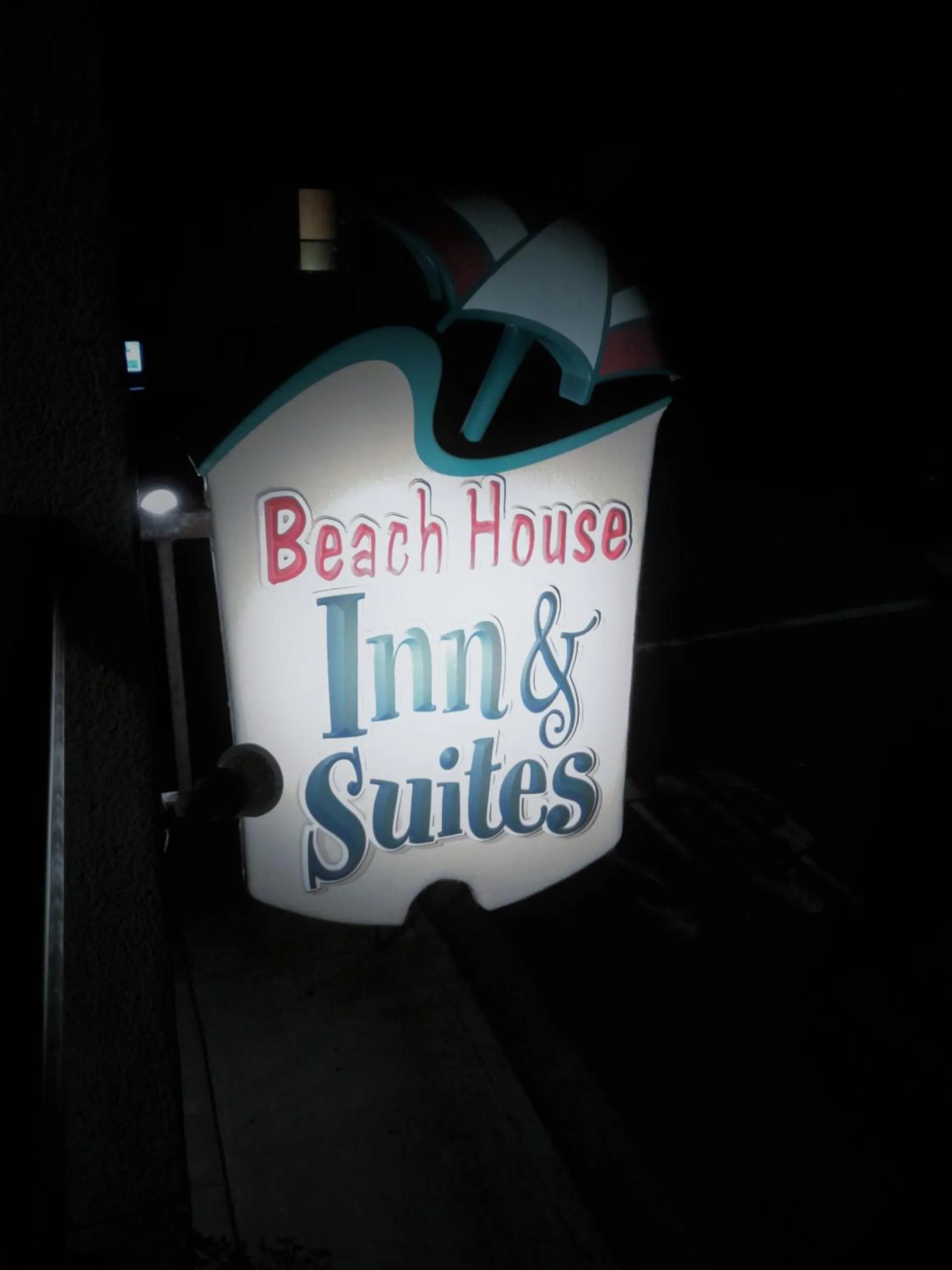 Property logo or sign in Beach House Inn & Suites