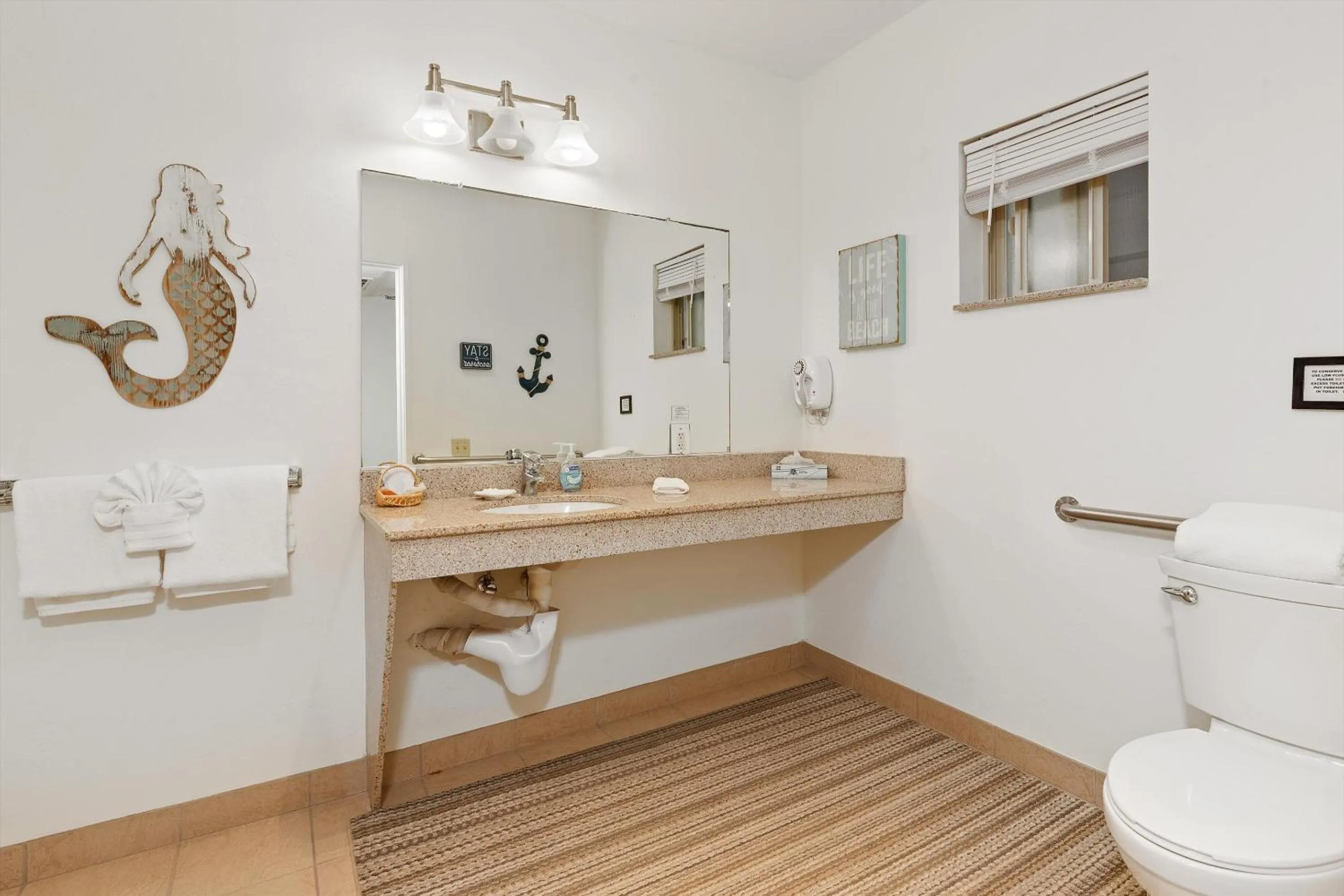 Bathroom in Beach House Inn & Suites