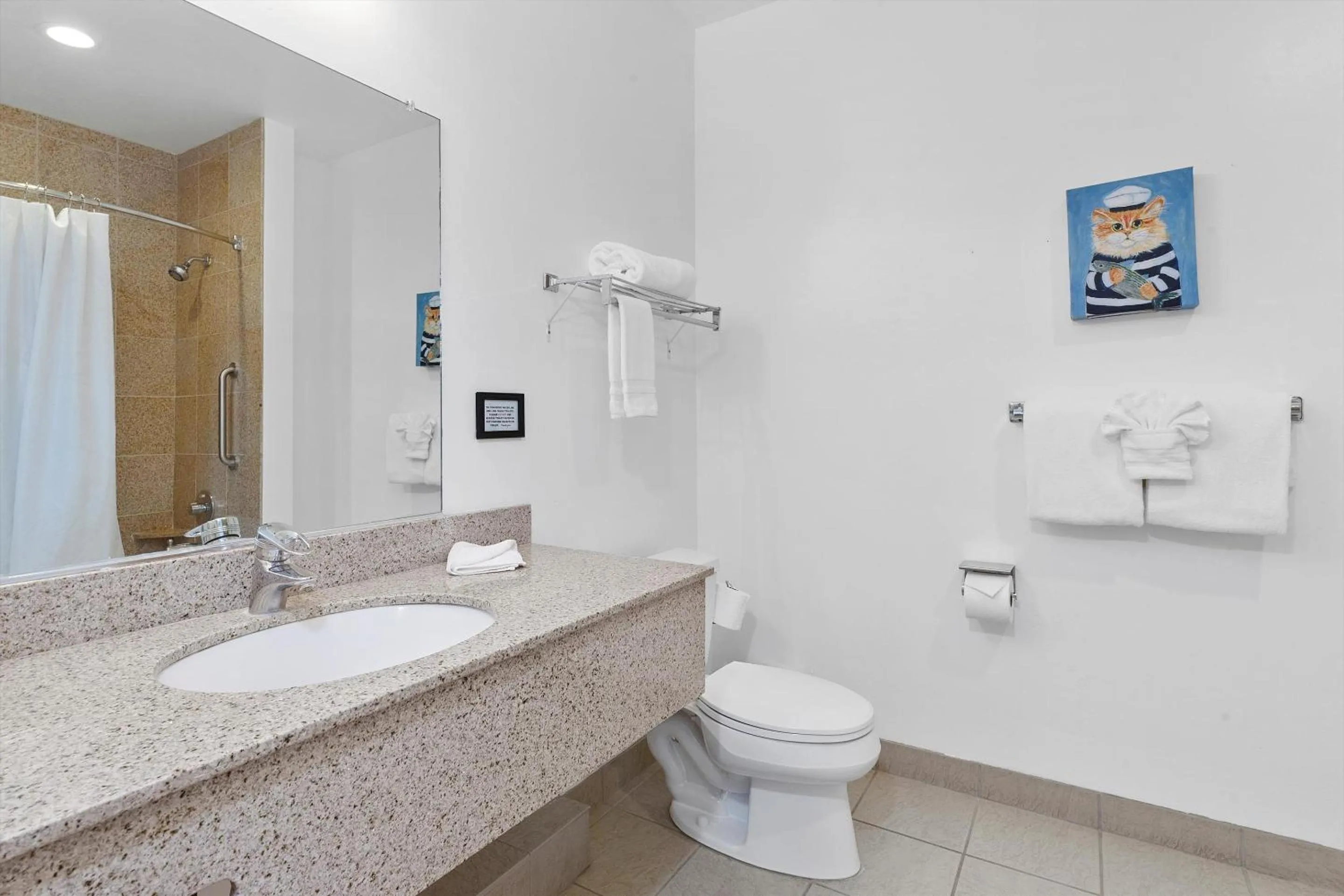 Bathroom in Beach House Inn & Suites