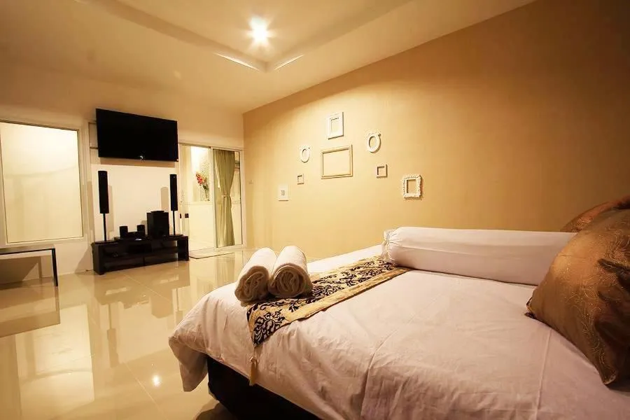 Bed in The Vista Pool Villa