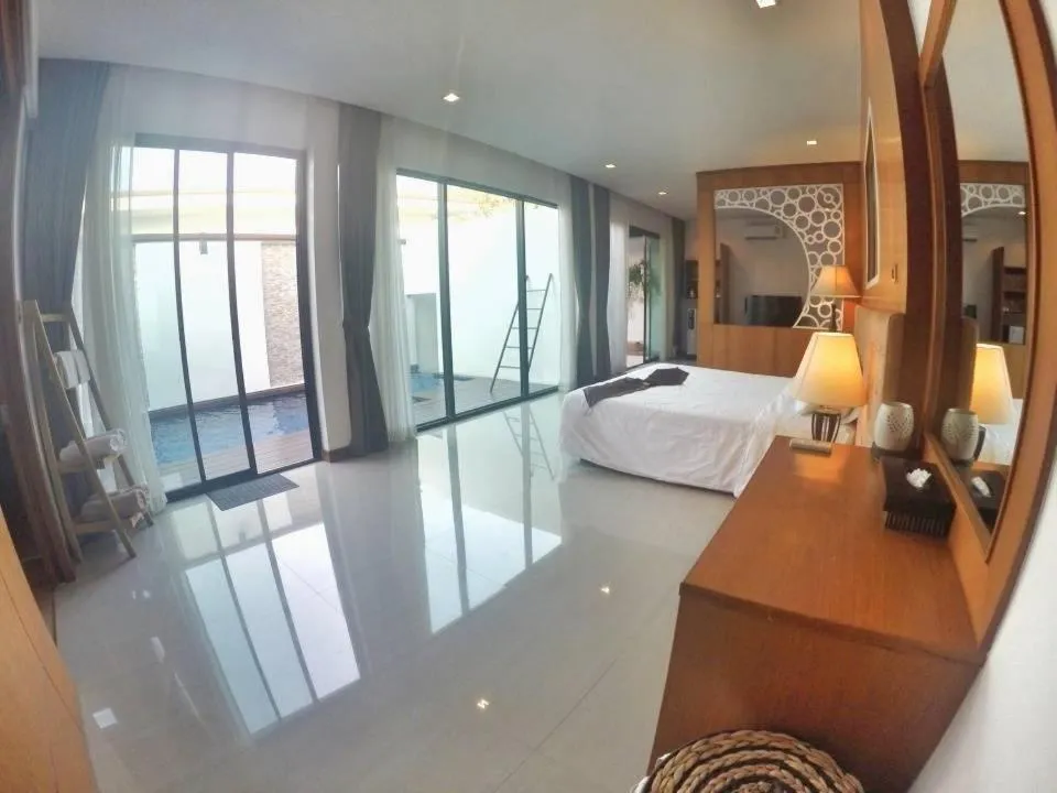 Bed in The Vista Pool Villa